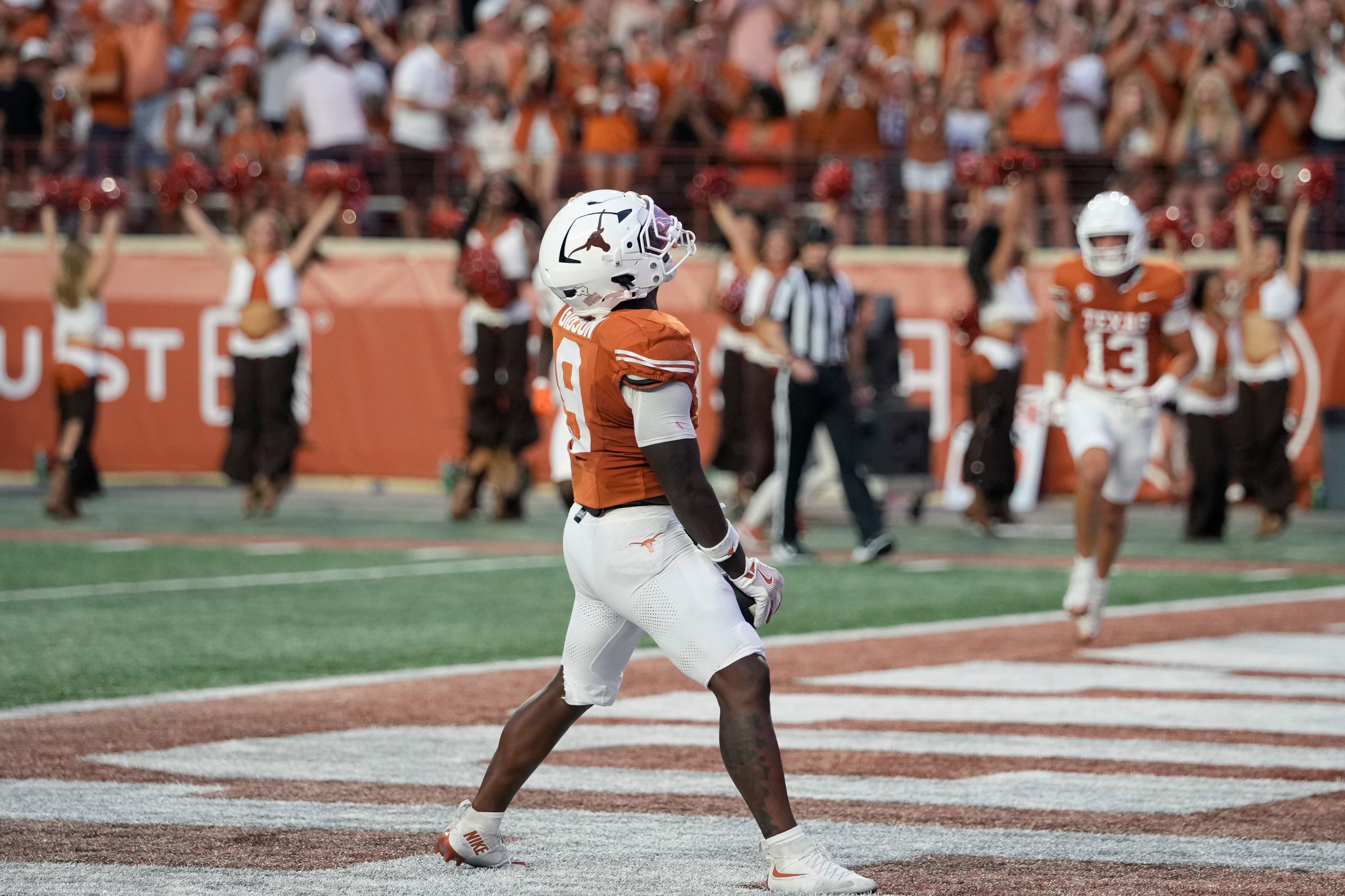 Sep 20, 2025; Austin, Texas, USA; Texas Longhorns running back Jerrick Gibson (9) reacts after scoring a touchdown during the first half against the Sam Houston Bearkats at Darrell K Royal-Texas Memorial Stadium. Mandatory Credit: Scott Wachter-Imagn Images