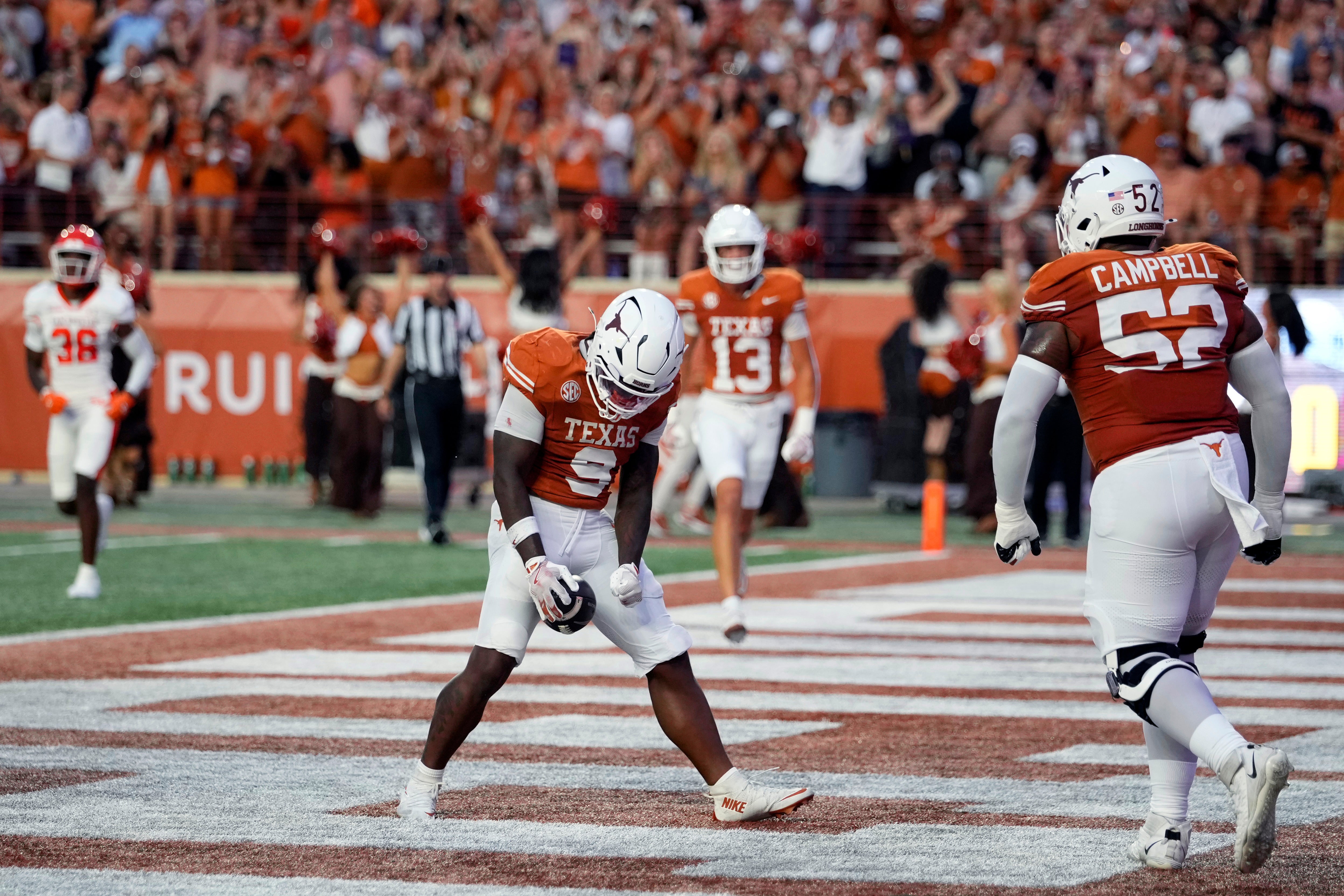 Sep 20, 2025; Austin, Texas, USA; Texas Longhorns running back Jerrick Gibson (9) reacts after scoring a touchdown during the first half against the Sam Houston Bearkats at Darrell K Royal-Texas Memorial Stadium. Mandatory Credit: Scott Wachter-Imagn Images