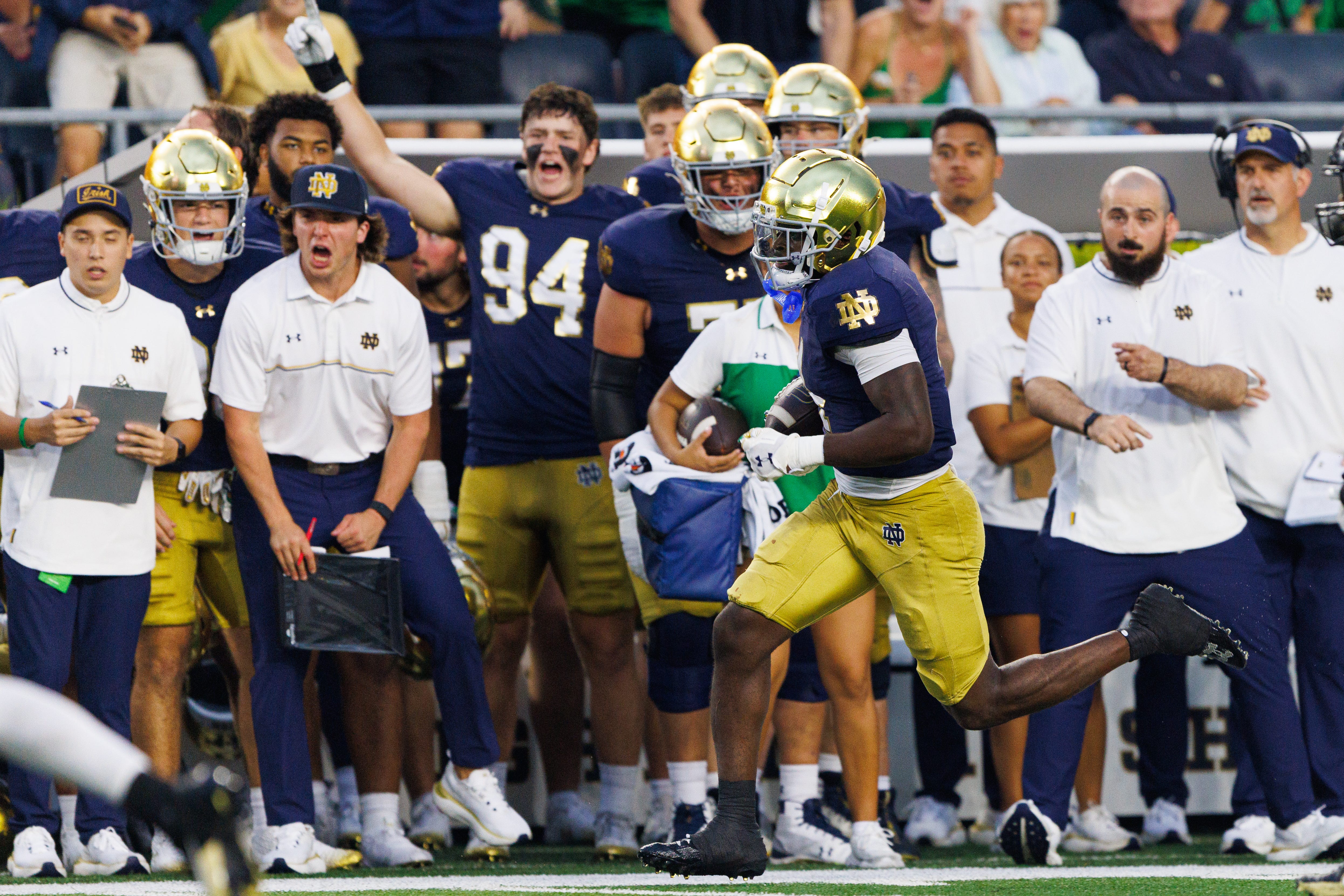 Notre Dame running back Jeremiyah Love runs down the sidelines on his way to score a touchdown during the second half of a NCAA football game against Purdue at Notre Dame Stadium on Saturday, Sept. 20, 2025, in South Bend.