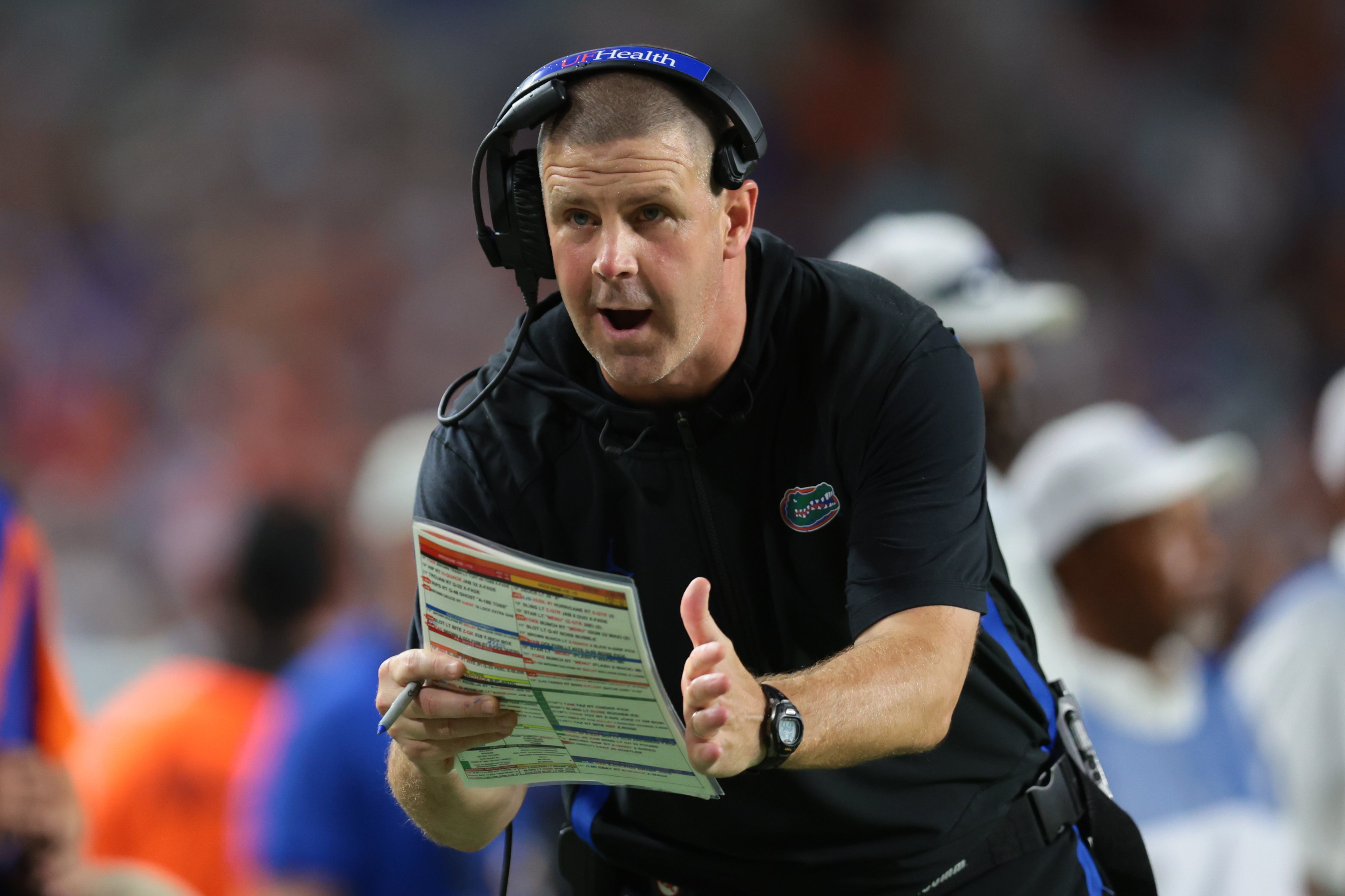 Sep 20, 2025; Miami Gardens, Florida, USA; Florida Gators head coach Billy Napier call for a timeout against the Miami Hurricanes during the fourth quarter at Hard Rock Stadium.