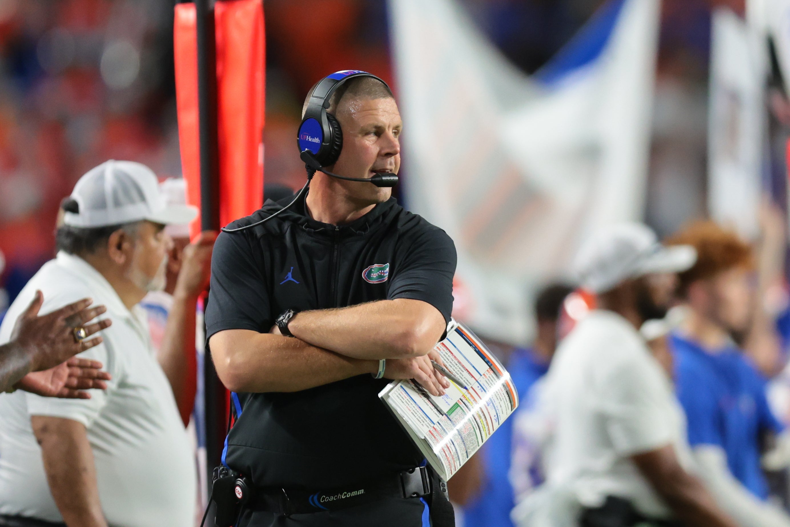Sep 20, 2025; Miami Gardens, Florida, USA; Florida Gators head coach Billy Napier watches from the sideline against the Miami Hurricanes during the third quarter at Hard Rock Stadium.
