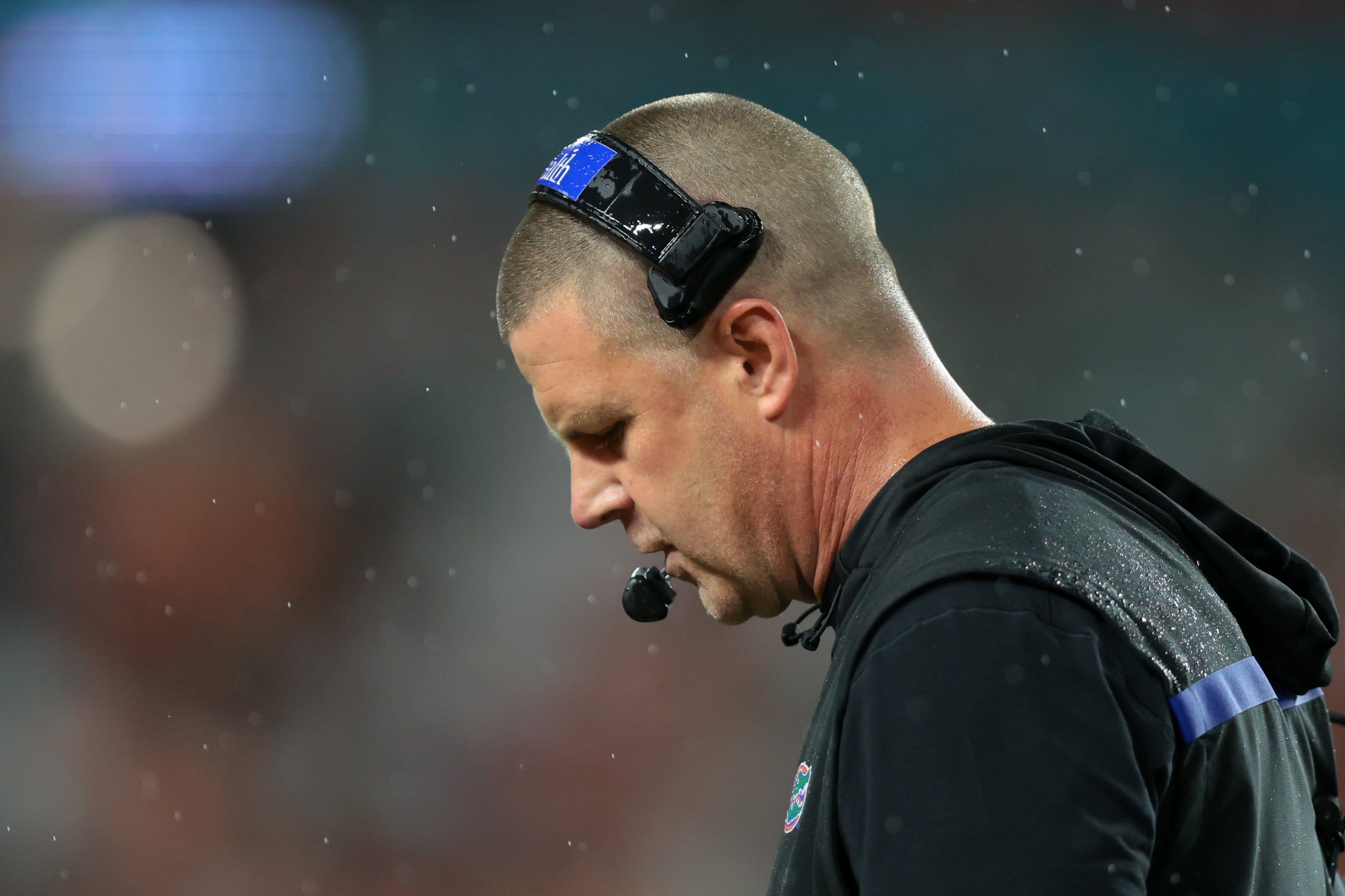 Sep 20, 2025; Miami Gardens, Florida, USA; Florida Gators head coach Billy Napier looks down against the Florida Gators during the first quarter at Hard Rock Stadium.