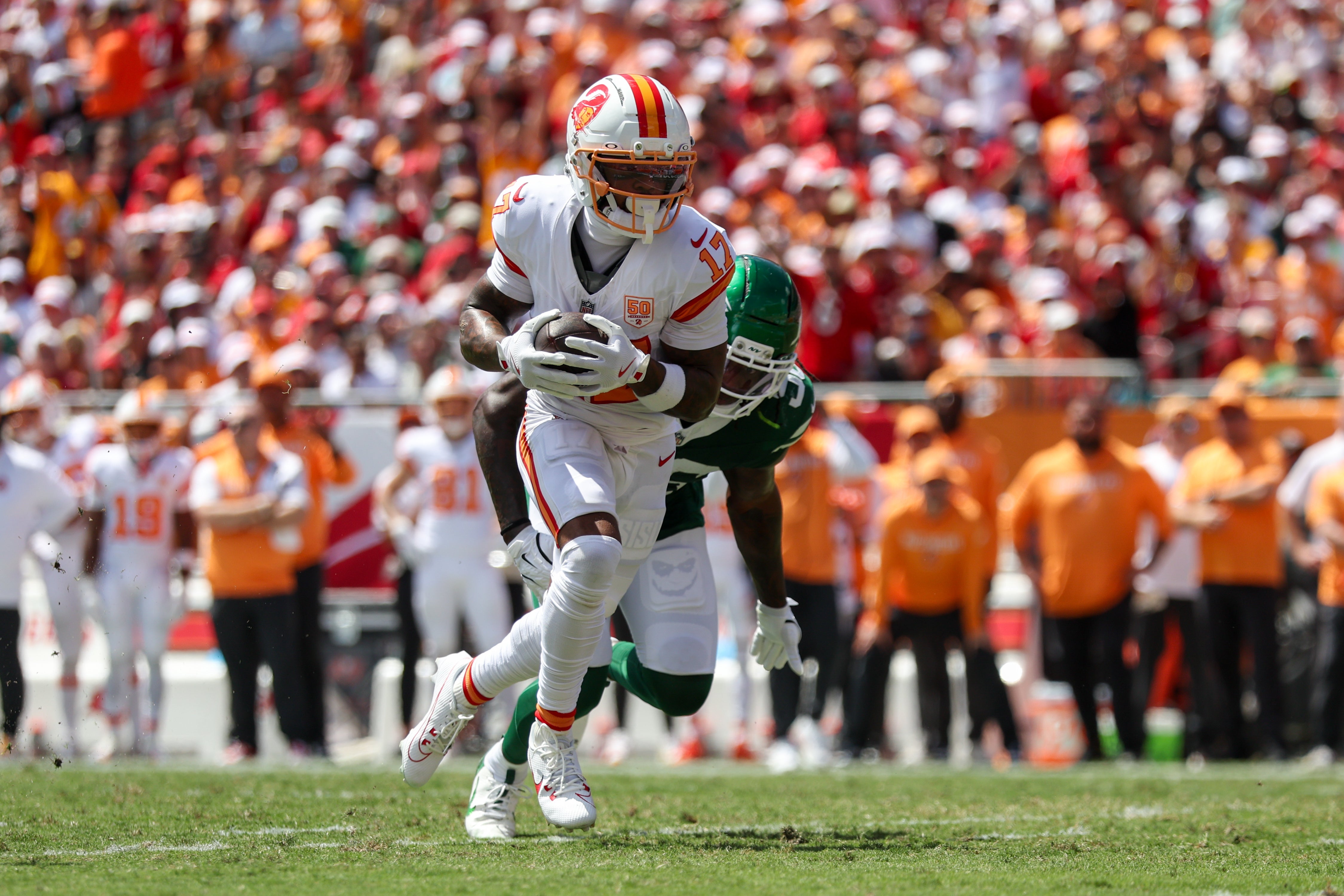Sep 21, 2025; Tampa, Florida, USA; Tampa Bay Buccaneers wide receiver Sterling Shepard (17) runs with the ball against the New York Jets in the first quarter at Raymond James Stadium.