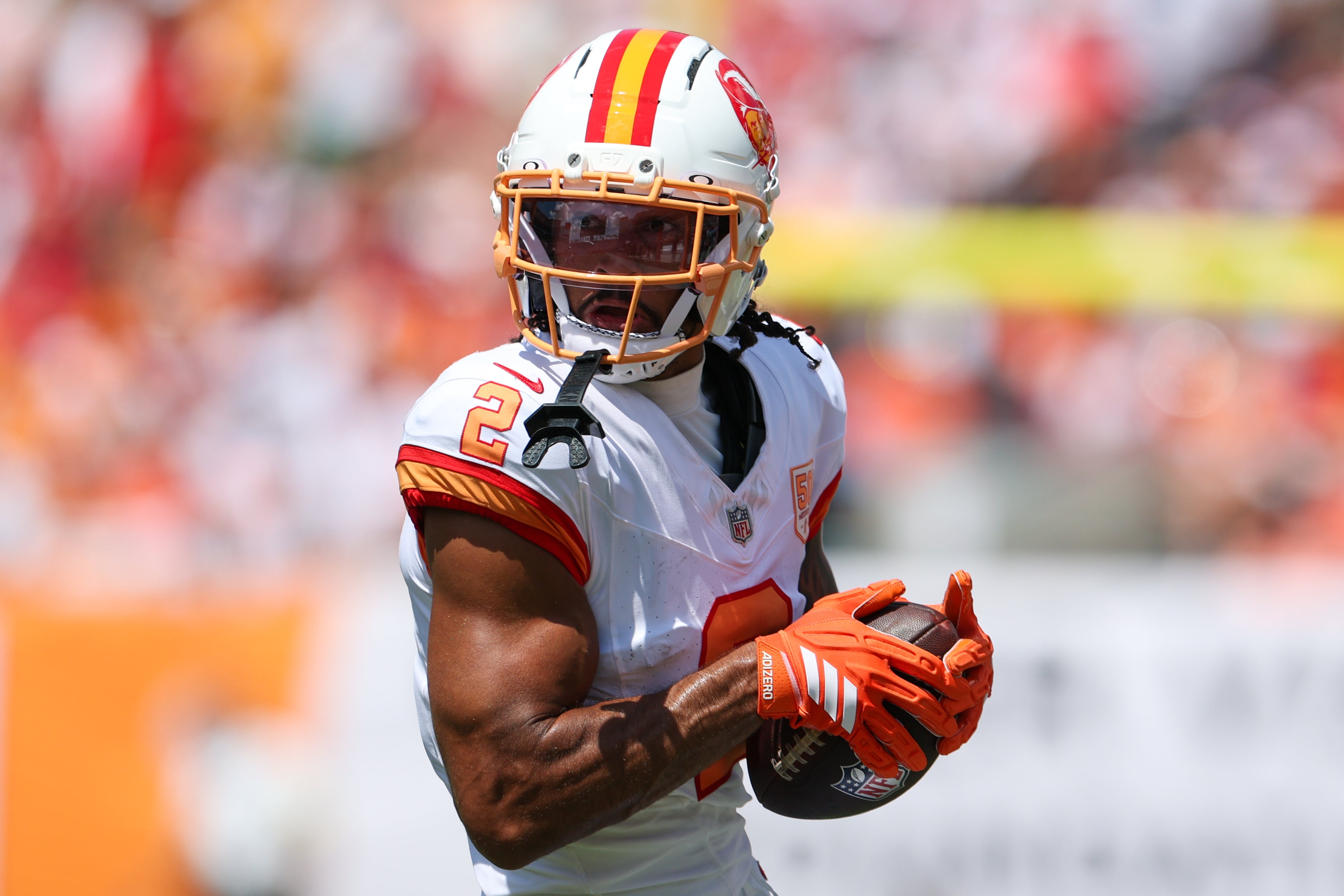 Sep 21, 2025; Tampa, Florida, USA; Tampa Bay Buccaneers wide receiver Emeka Egbuka (2) receives a pass against the New York Jets in the second quarter at Raymond James Stadium.