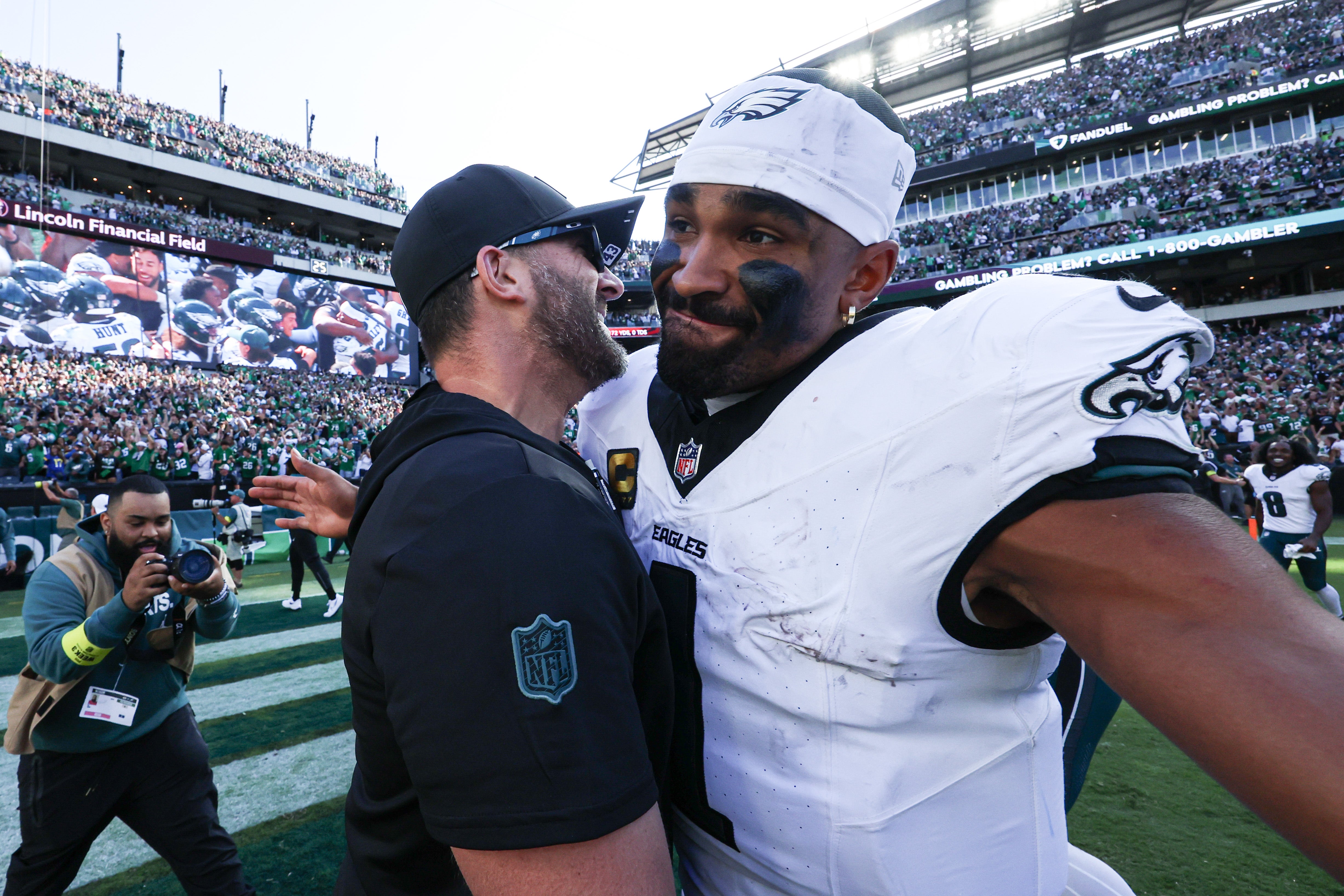 Sep 21, 2025; Philadelphia, Pennsylvania, USA; Philadelphia Eagles quarterback Jalen Hurts (1) and head coach Nick Sirianni celebrate after a victory against the Los Angeles Rams at Lincoln Financial Field.