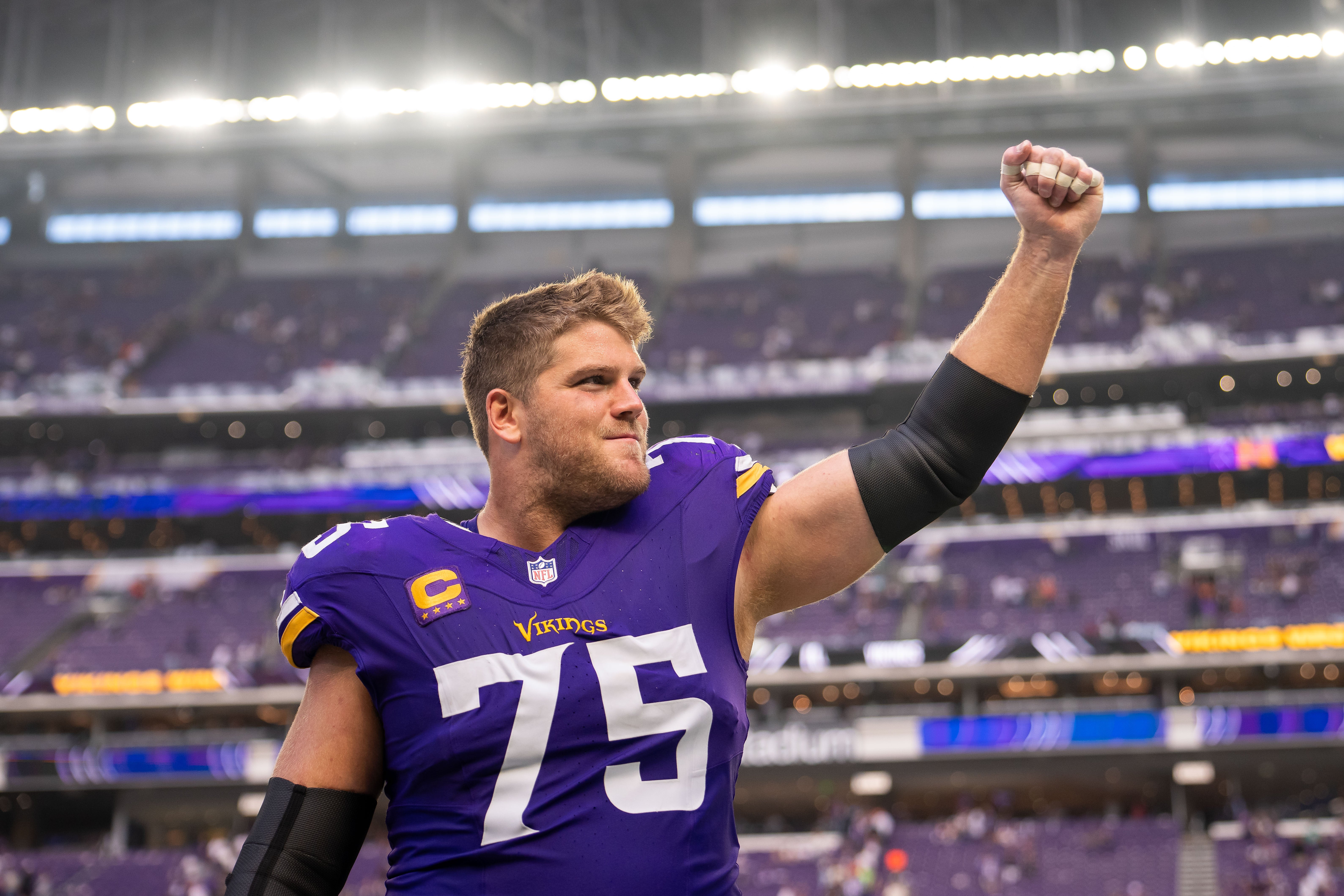 Sep 21, 2025; Minneapolis, Minnesota, USA; Minnesota Vikings offensive tackle Brian O'Neill (75) reacts towards the fans following the game against the Cincinnati Bengals at U.S. Bank Stadium.