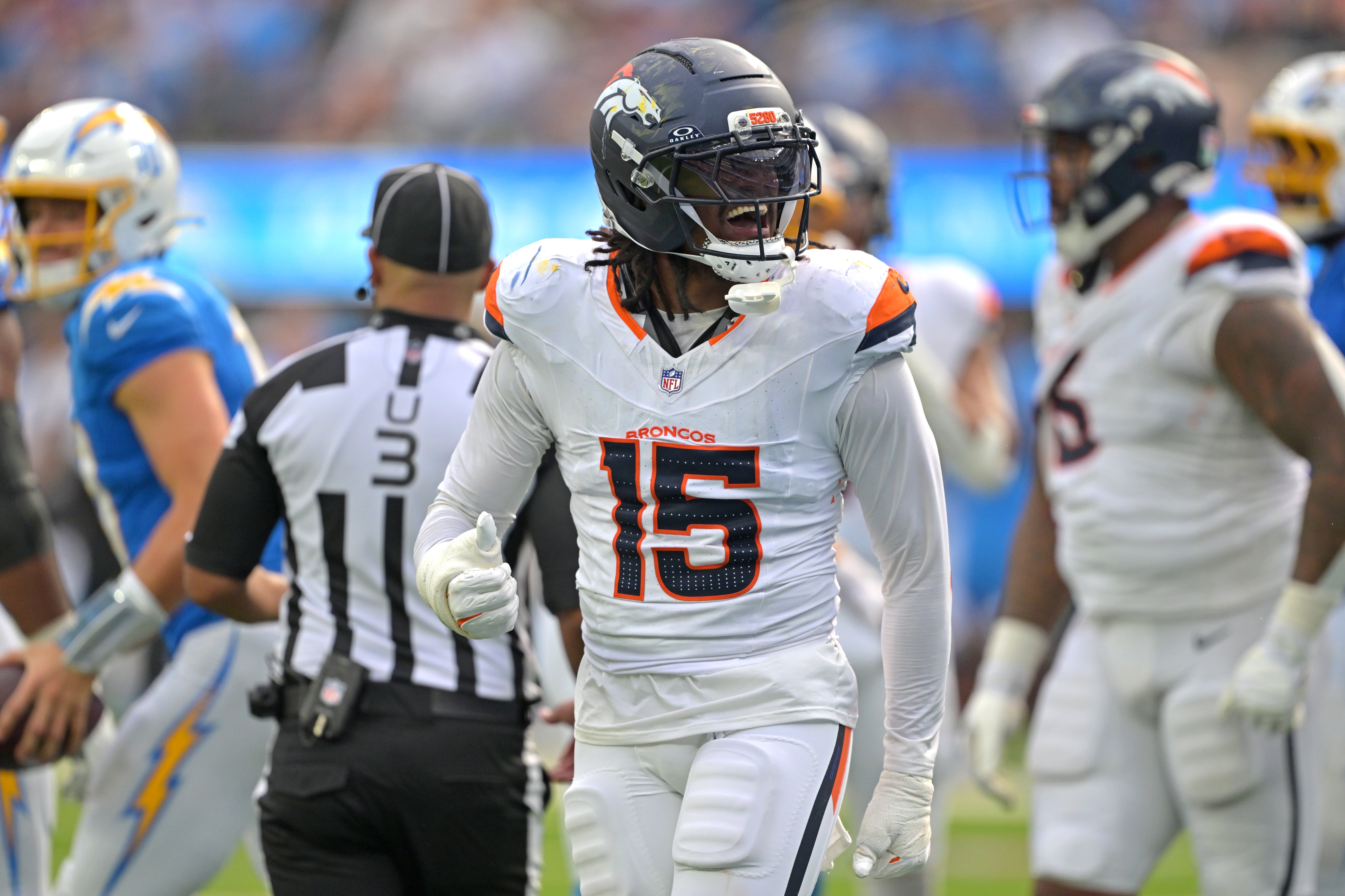 Sep 21, 2025; Inglewood, California, USA; Denver Broncos linebacker Nik Bonitto (15) celebrates after a sack of Los Angeles Chargers quarterback Justin Herbert (10) in the second half at SoFi Stadium.