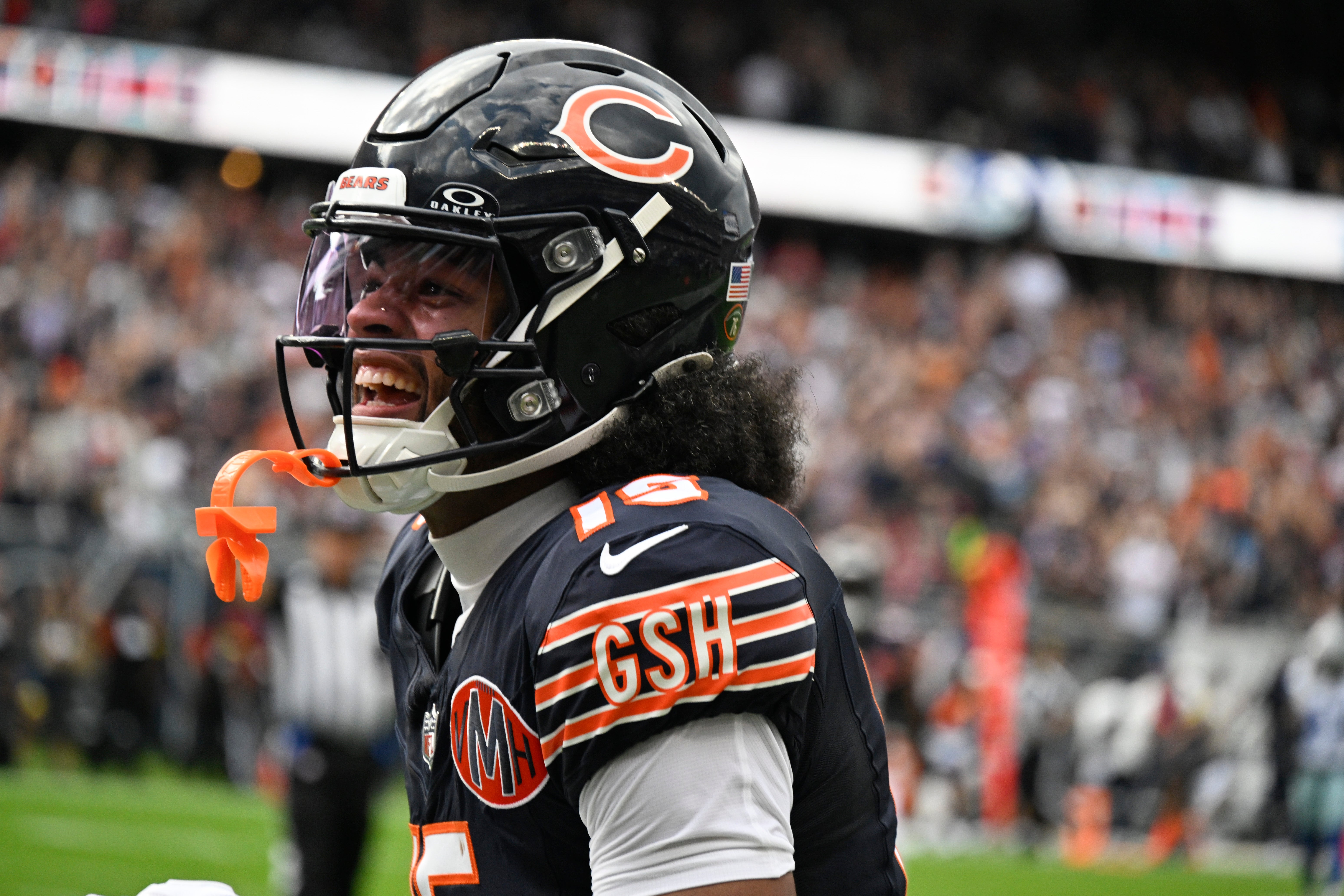 Sep 21, 2025; Chicago, Illinois, USA; Chicago Bears Rome Odunze yells after scoring a touchdown against the Dallas Cowboys during the first half at Soldier Field.