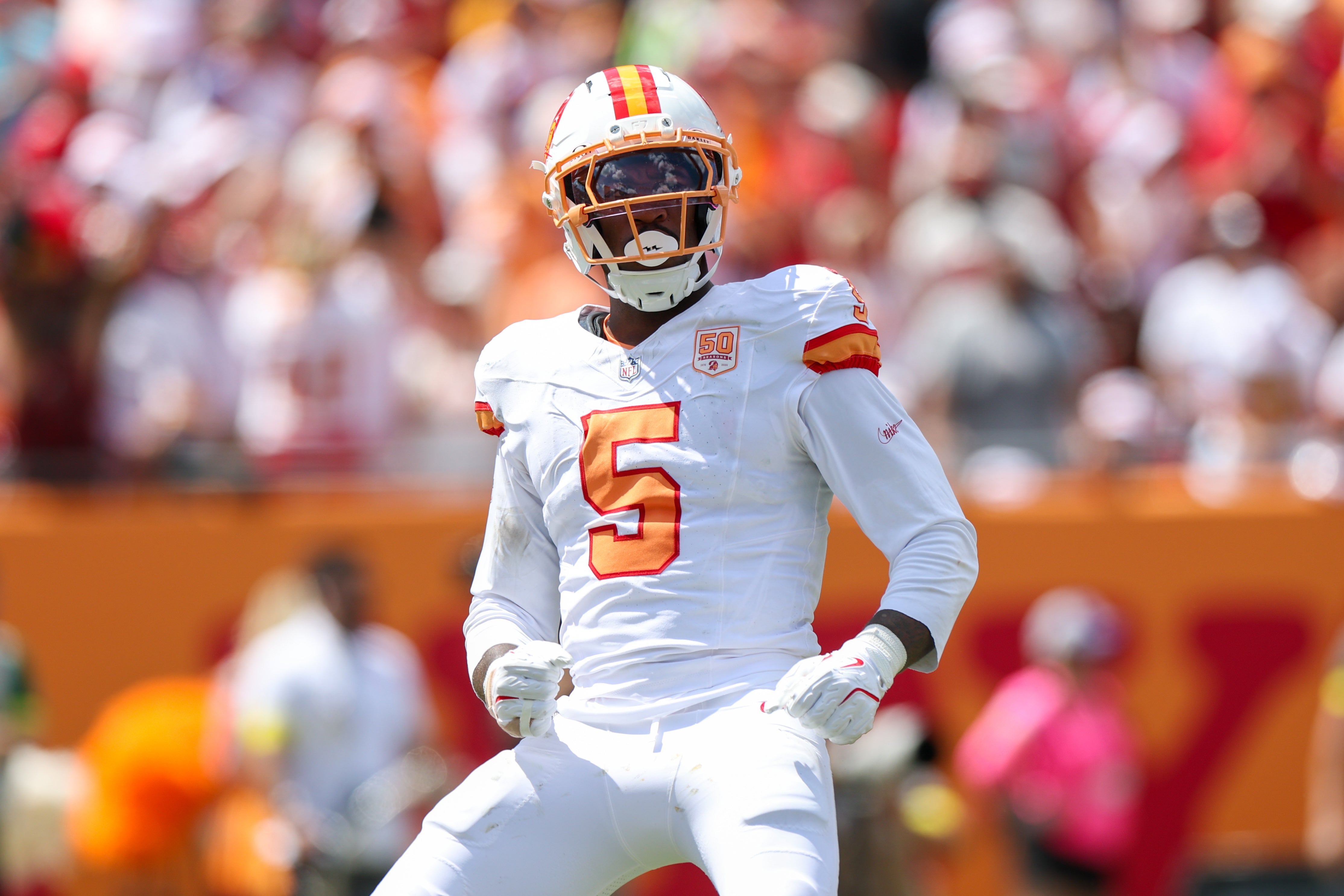 Sep 21, 2025; Tampa, Florida, USA; Tampa Bay Buccaneers outside linebacker Haason Reddick (5) reacts after a play against the New York Jets in the second quarter at Raymond James Stadium.