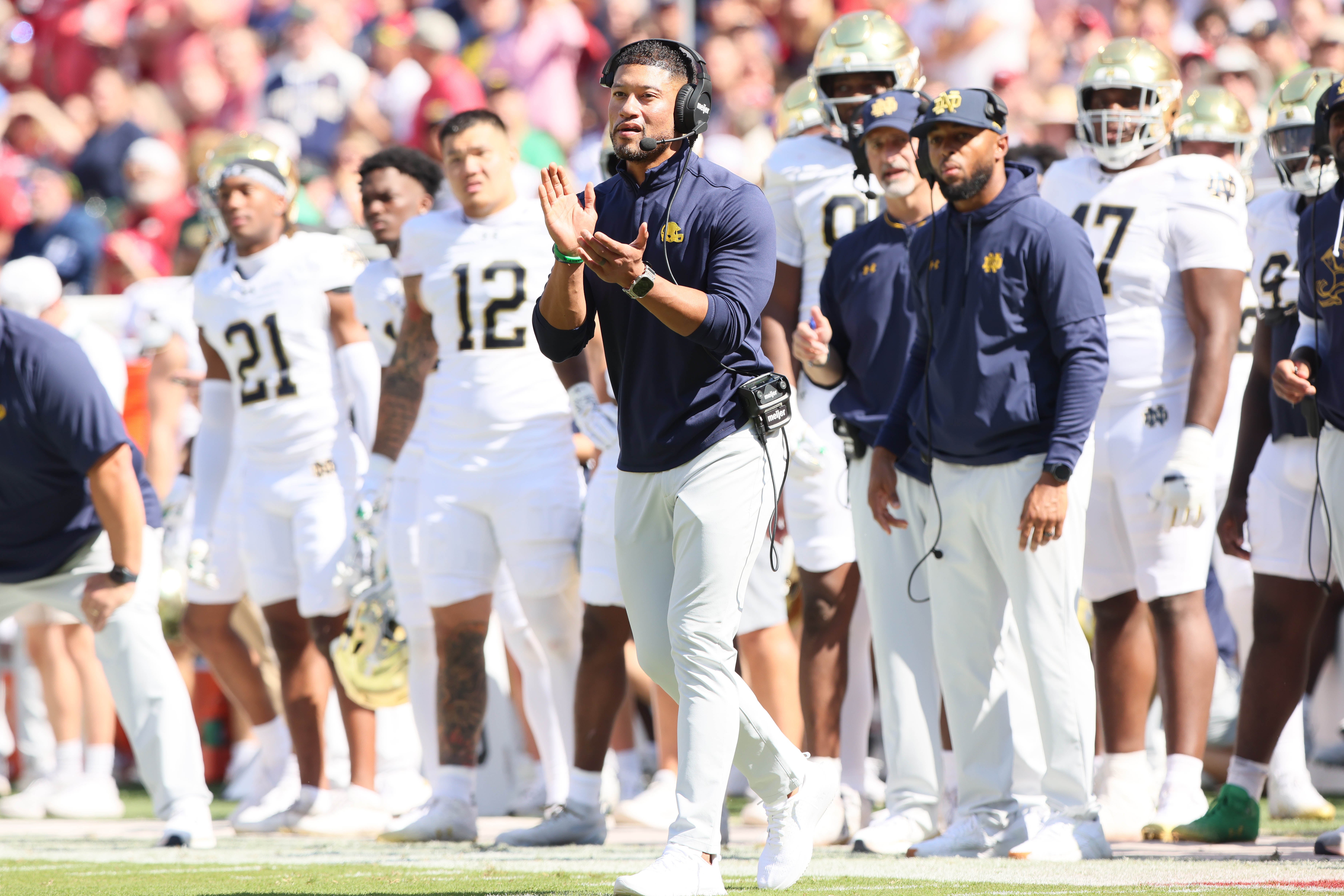 Sep 27, 2025; Fayetteville, Arkansas, USA; Notre Dame Fighting Irish head coach Marcus Freeman during the first quarter against the Arkansas Razorbacks at Donald W. Reynolds Razorback Stadium. Mandatory Credit: Nelson Chenault-Imagn Images