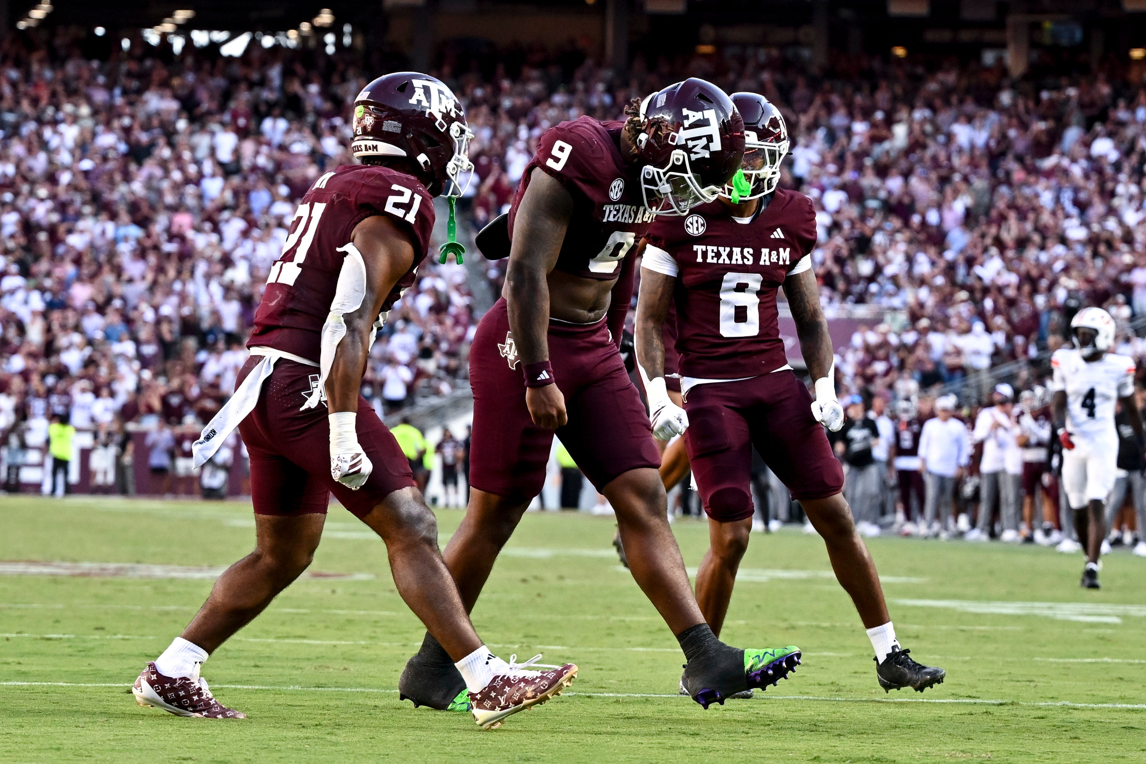 Sep 27, 2025; College Station, Texas, USA; Texas A&M Aggies defensive end Cashius Howell (9) reacts after sacking Auburn Tigers quarterback Jackson Arnold (not pictured) during the fourth quarter at Kyle Field.