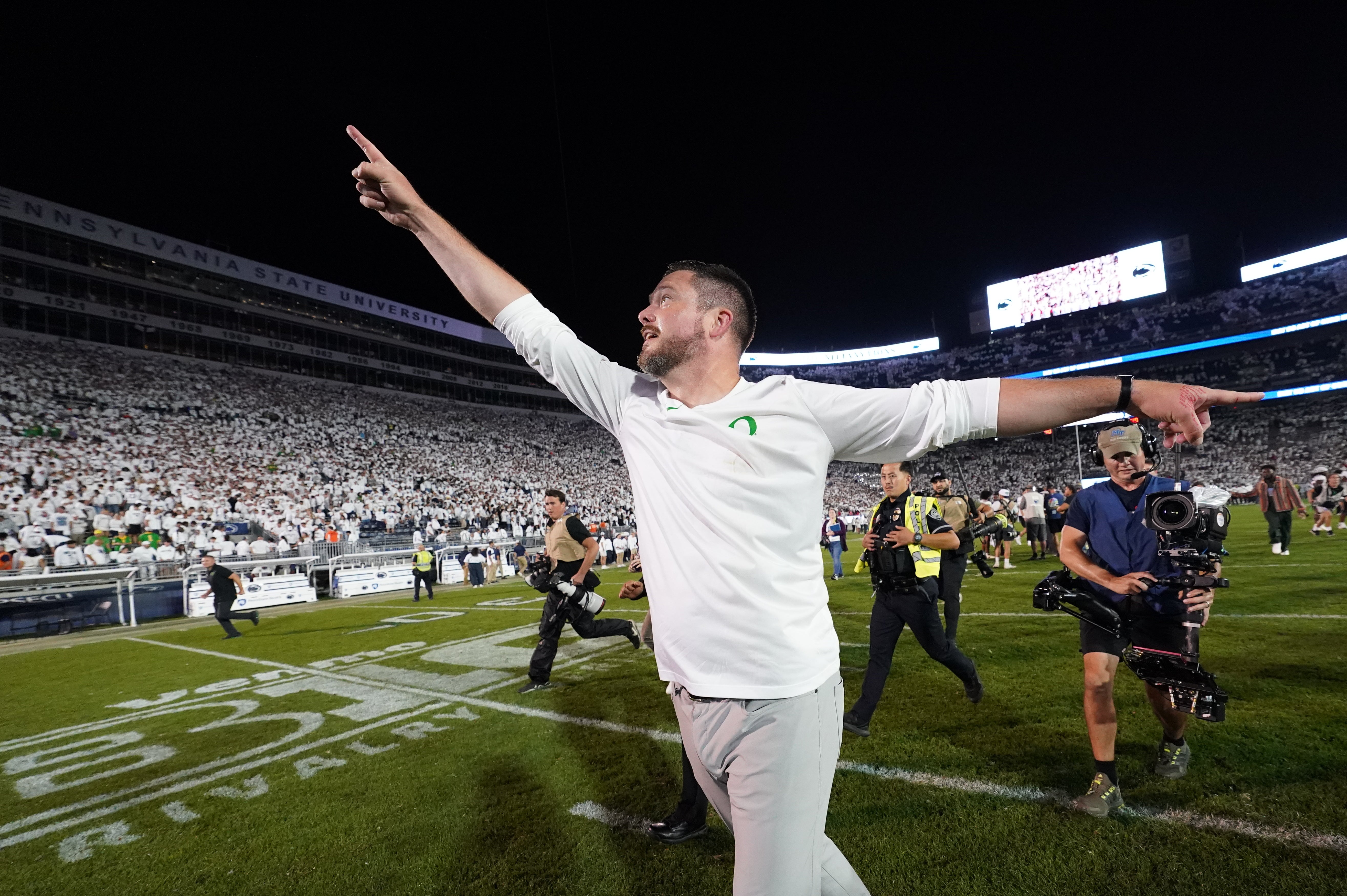 Sep 27, 2025; University Park, Pennsylvania, USA; Oregon Ducks head coach Dan Lanning reacts after defeating the Penn State Nittany Lions at Beaver Stadium. Mandatory Credit: James Lang-Imagn Images