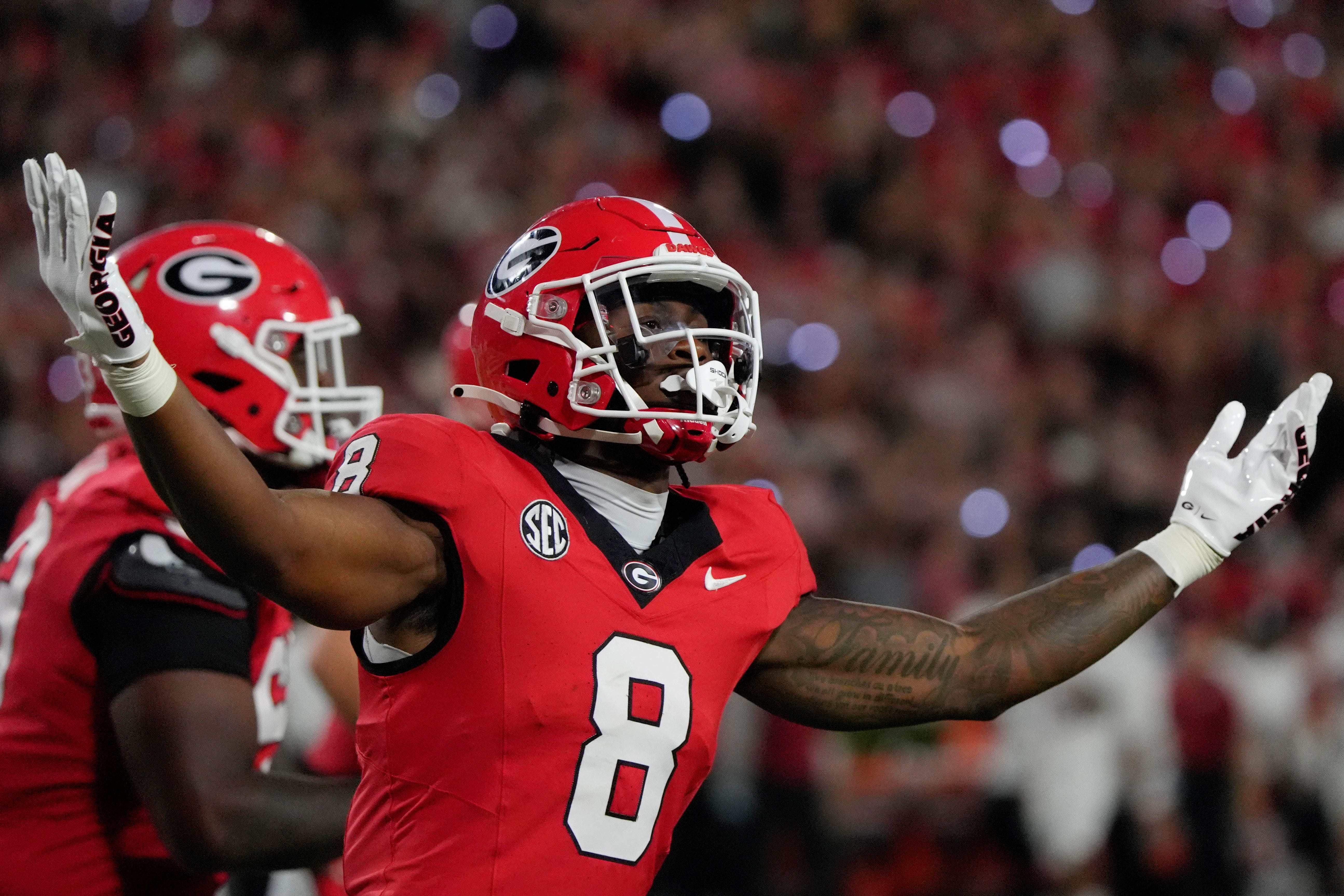 Georgia Bulldogs wide receiver Colbie Young (8) celebrates after scoring a touchdown during the first half of a NCAA college football game against Alabama in Athens, Ga., on Saturday, September 27, 20.