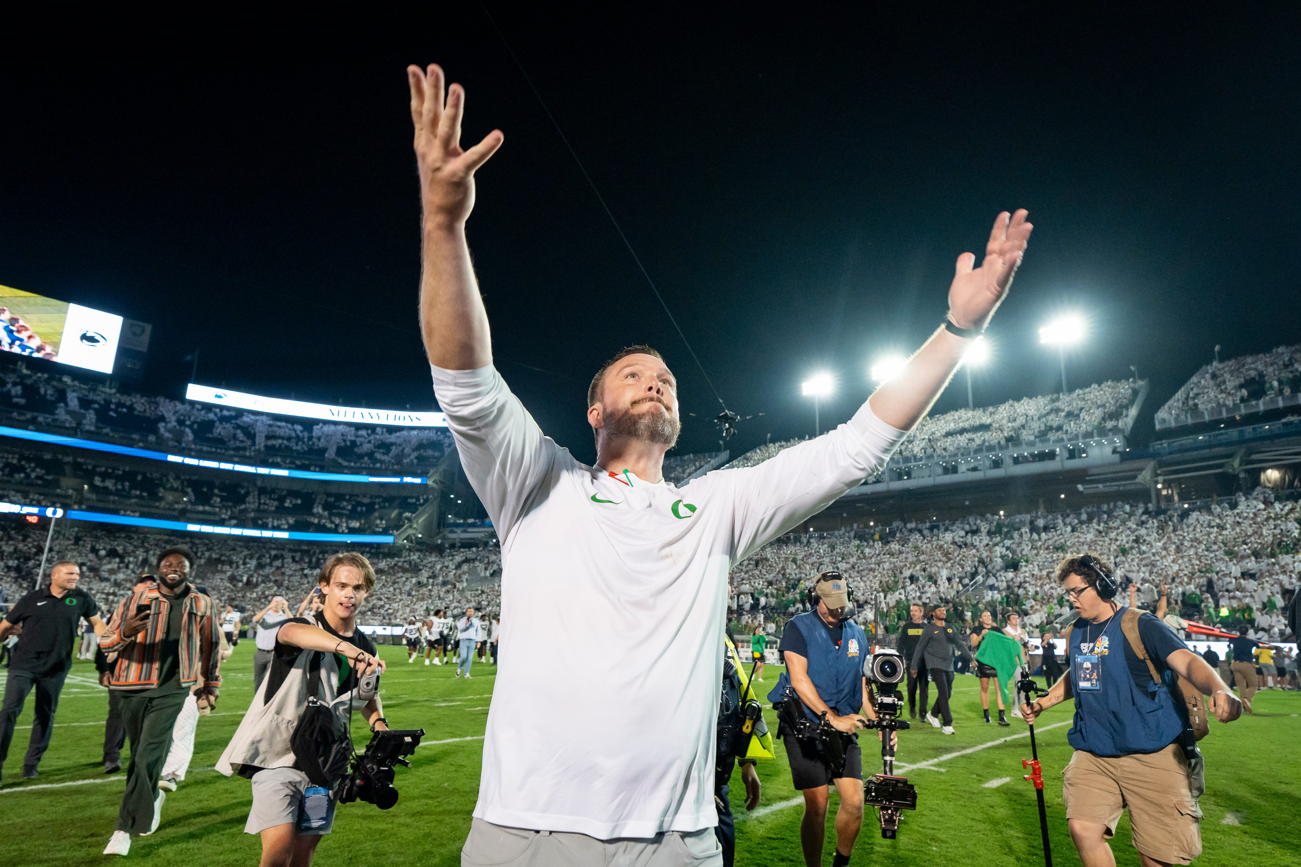 Oregon head coach Dan Lanning celebrates the Ducks’ win as the Oregon Ducks face the Penn State Nittany Lions on Sept. 27, 2025, at Beaver Stadium in University Park, Pennsylvania.
