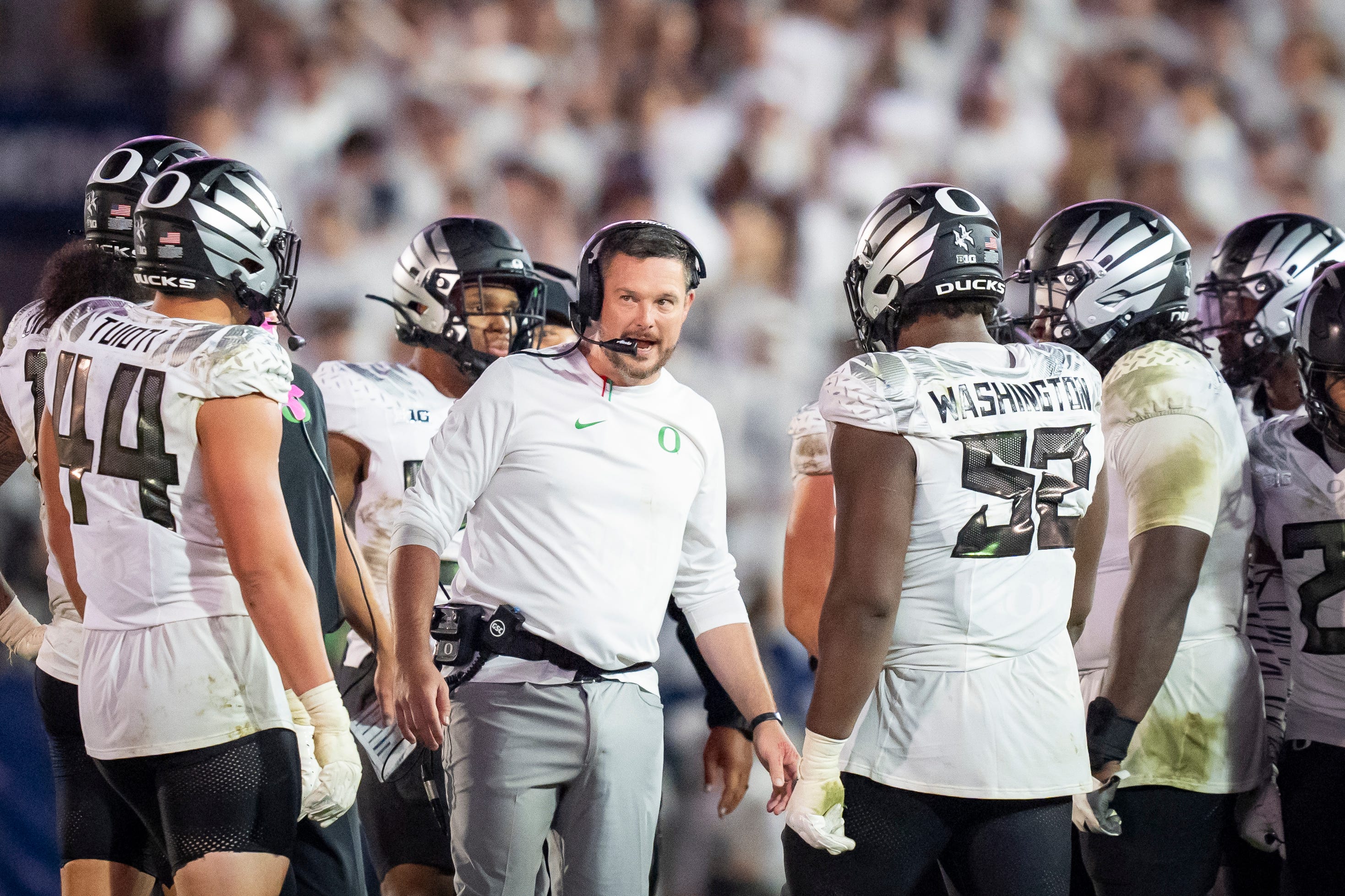 Oregon head coach Dan Lanning talks to players in the fourth quarter as the Oregon Ducks face the Penn State Nittany Lions on Sept. 27, 2025, at Beaver Stadium in University Park, Pennsylvania.