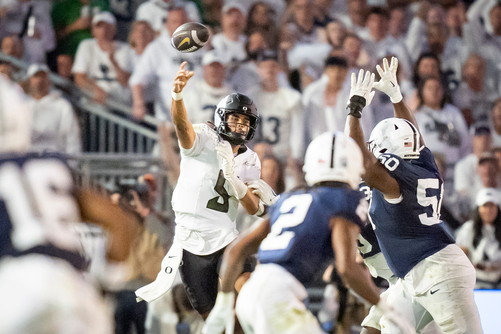 Oregon quarterback Dante Moore throws a pass as the Oregon Ducks face the Penn State Nittany Lions on Sept. 27, 2025, at Beaver Stadium in University Park, Pennsylvania.