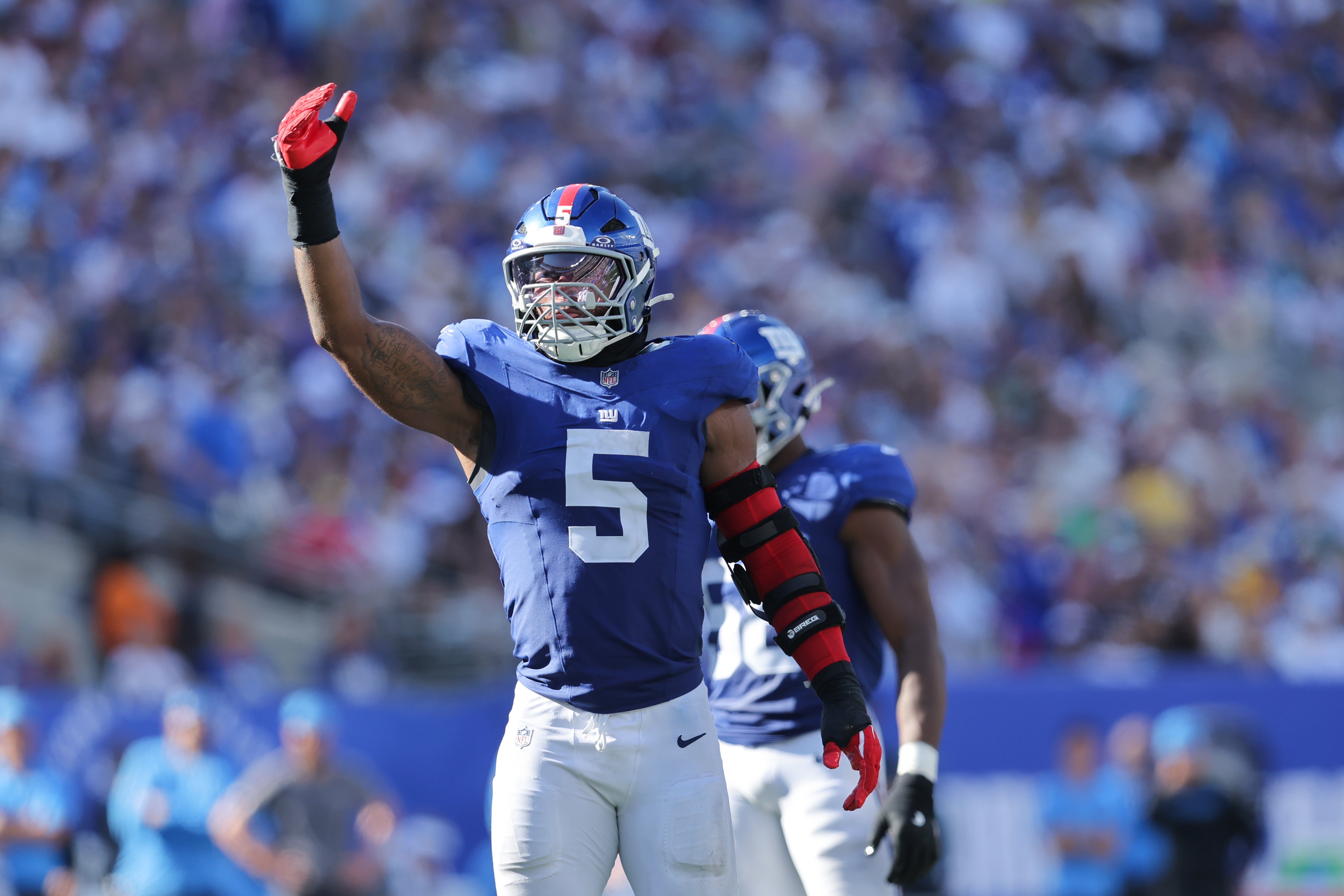Sep 28, 2025; East Rutherford, New Jersey, USA; New York Giants linebacker Kayvon Thibodeaux (5)reacts during the fourth quarter against the Los Angeles Chargers at MetLife Stadium. Mandatory Credit: Brad Penner-Imagn Images