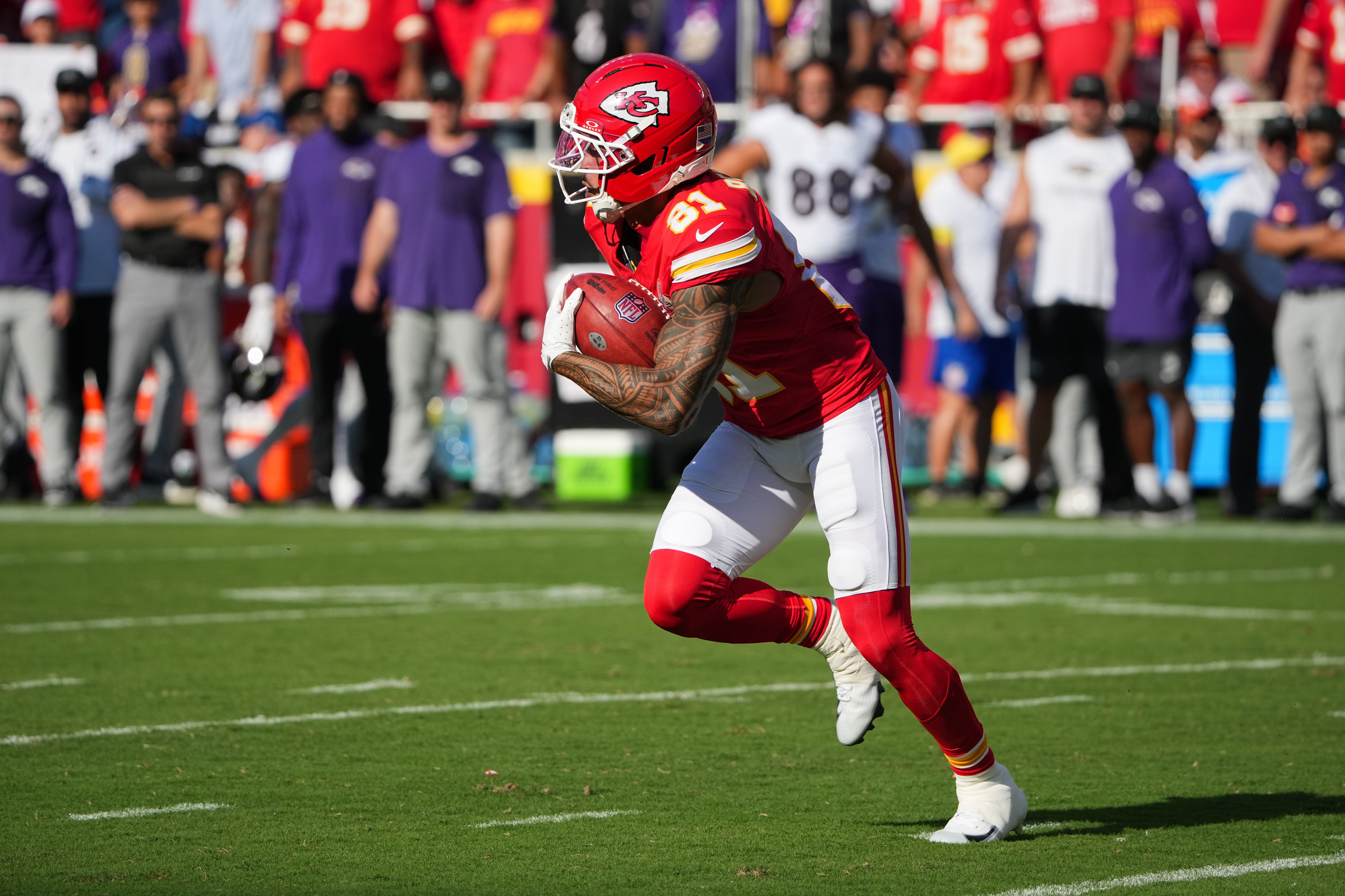 Kansas City Chiefs wide receiver Nikko Remigio (81) runs with the ball during the second quarter against the Baltimore Ravens