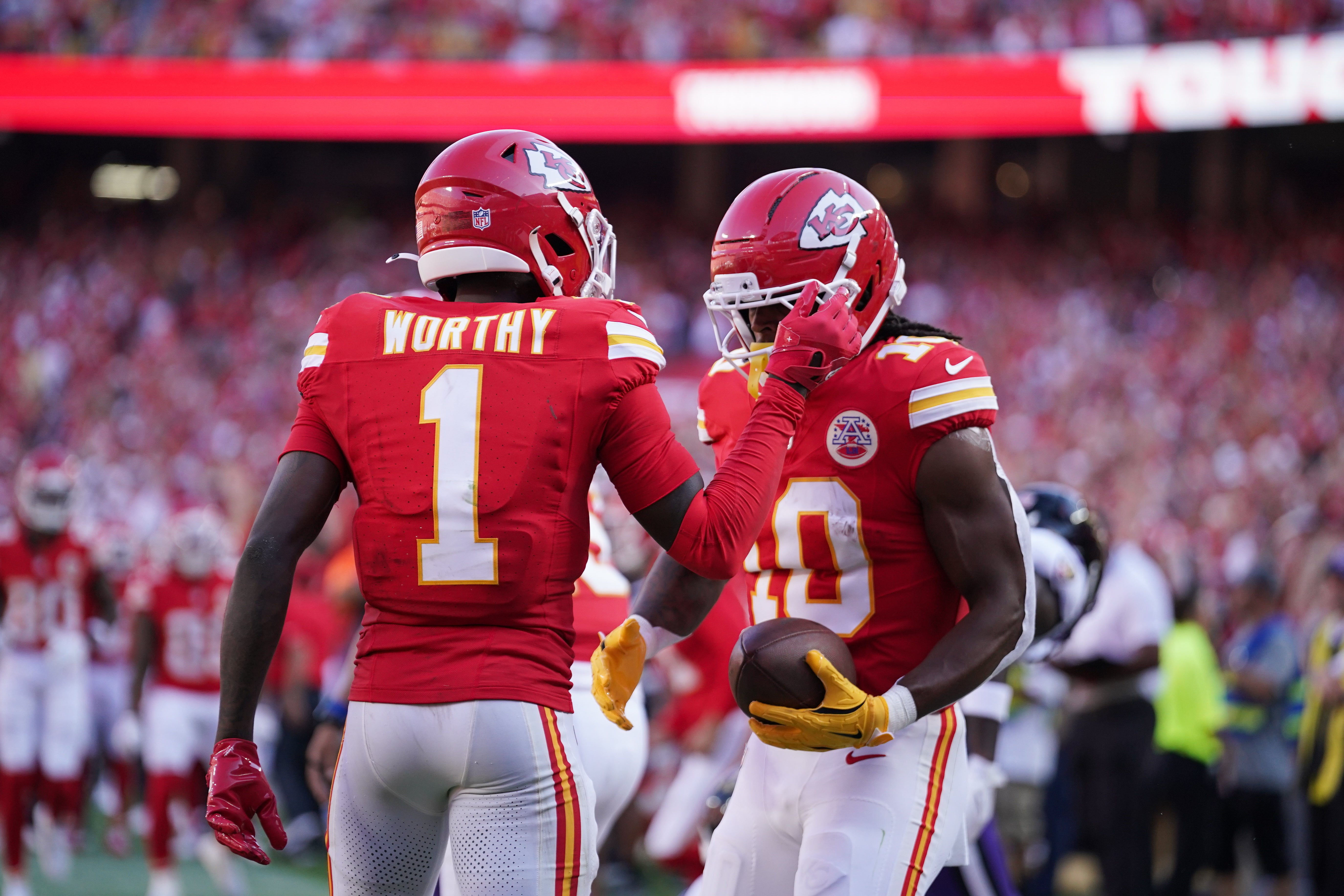 Kansas City Chiefs running back Isiah Pacheco (10) celebrates with wide receiver Xavier Worthy (1) after scoring a touchdown