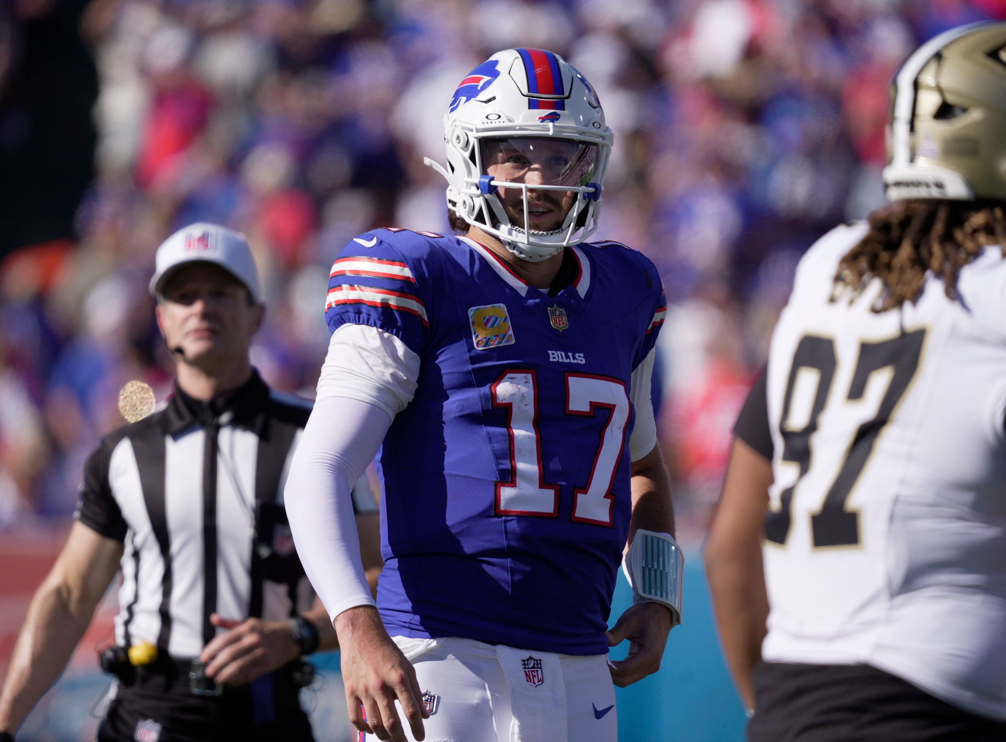 Buffalo Bills quarterback Josh Allen is all smiles after his long carry for a first down during second half action of the Bills home game against the New Orleans Saints in Orchard Park on Sept. 28, 2025.