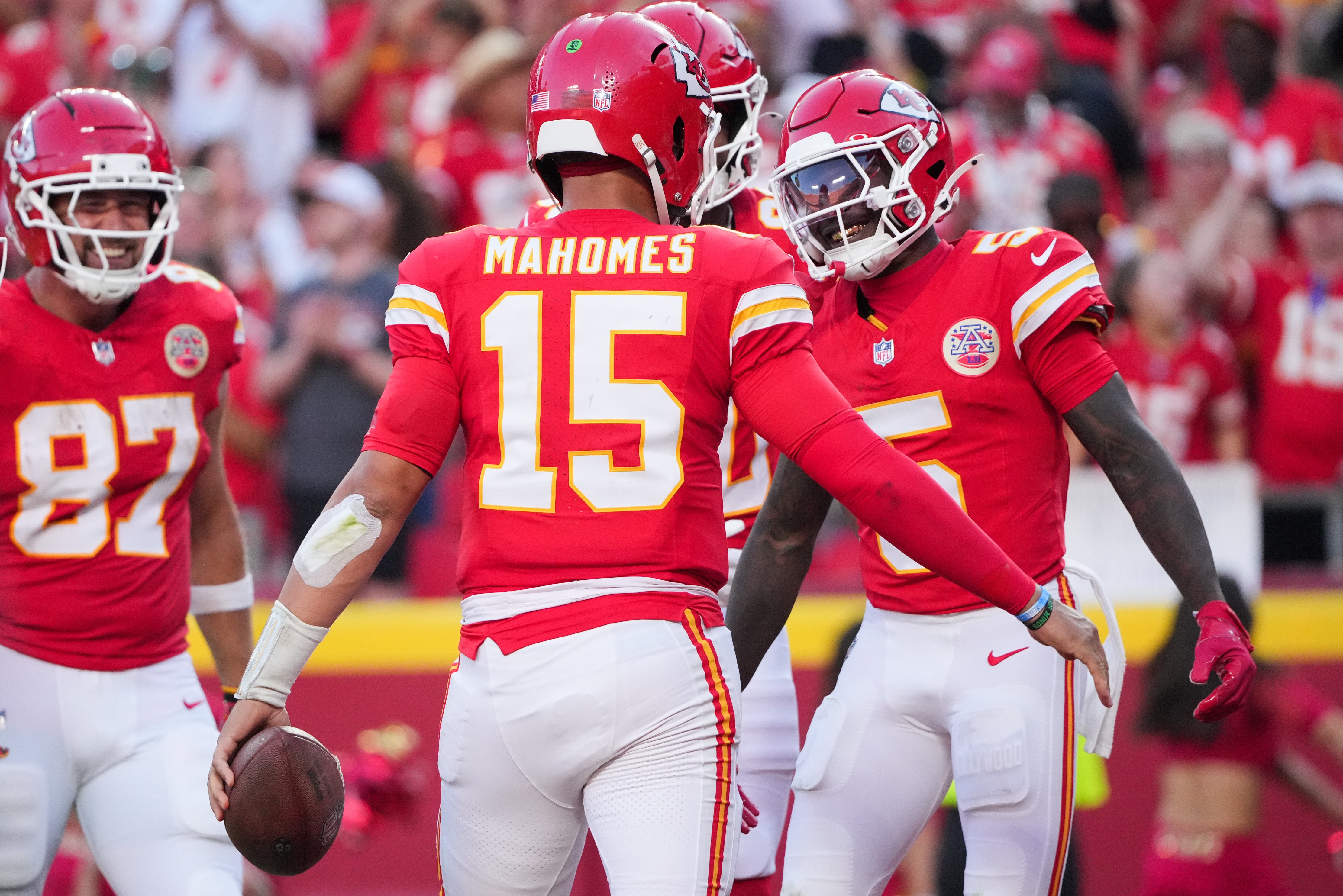 Kansas City Chiefs wide receiver Hollywood Brown (5) celebrates with Kansas City Chiefs quarterback Patrick Mahomes (15) after scoring a touchdown during the fourth quarter against the Baltimore Ravens
