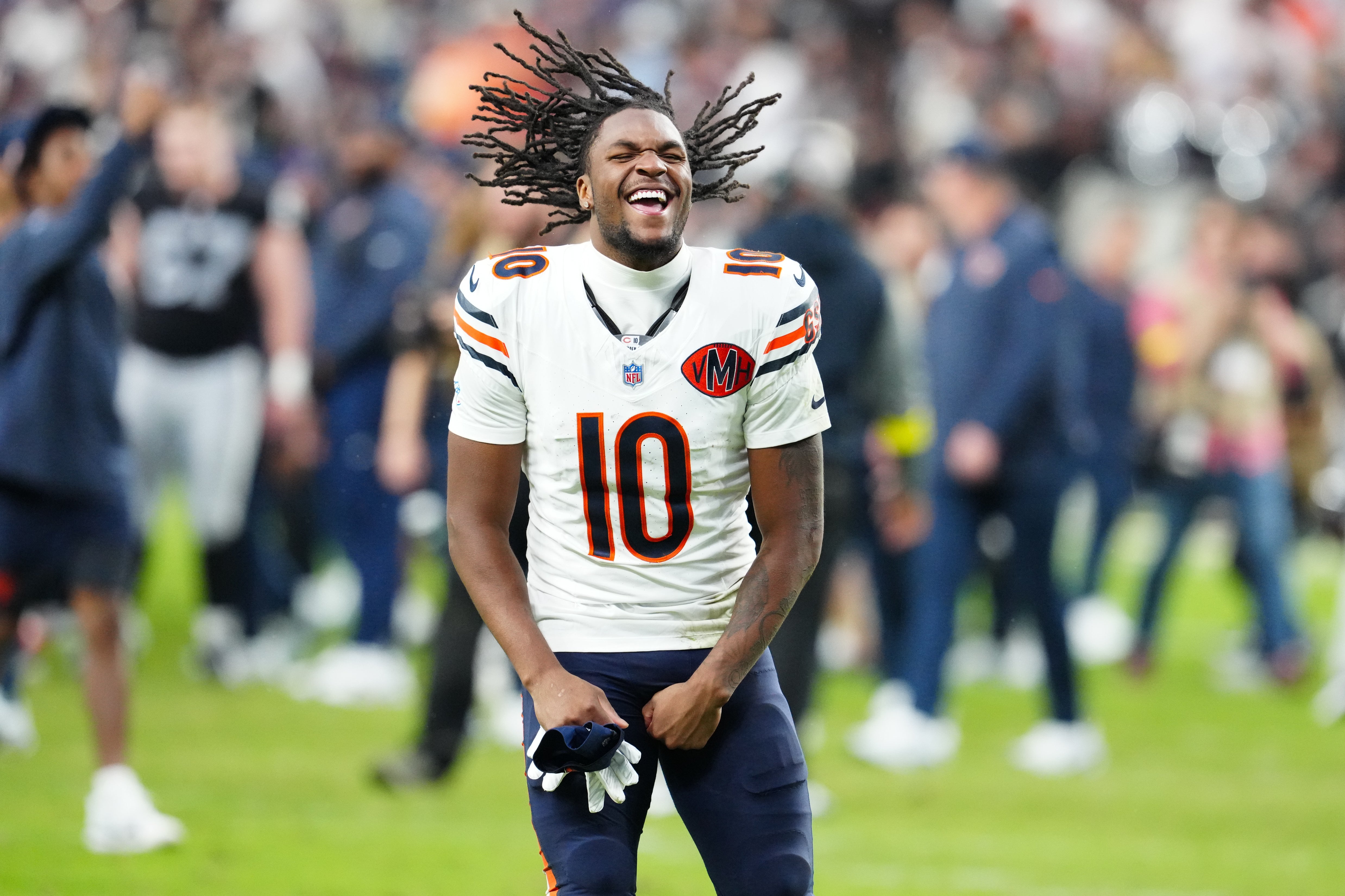 Sep 28, 2025; Paradise, Nevada, USA; Chicago Bears wide receiver Luther Burden III (10) celebrates after the game against the Las Vegas Raiders at Allegiant Stadium.