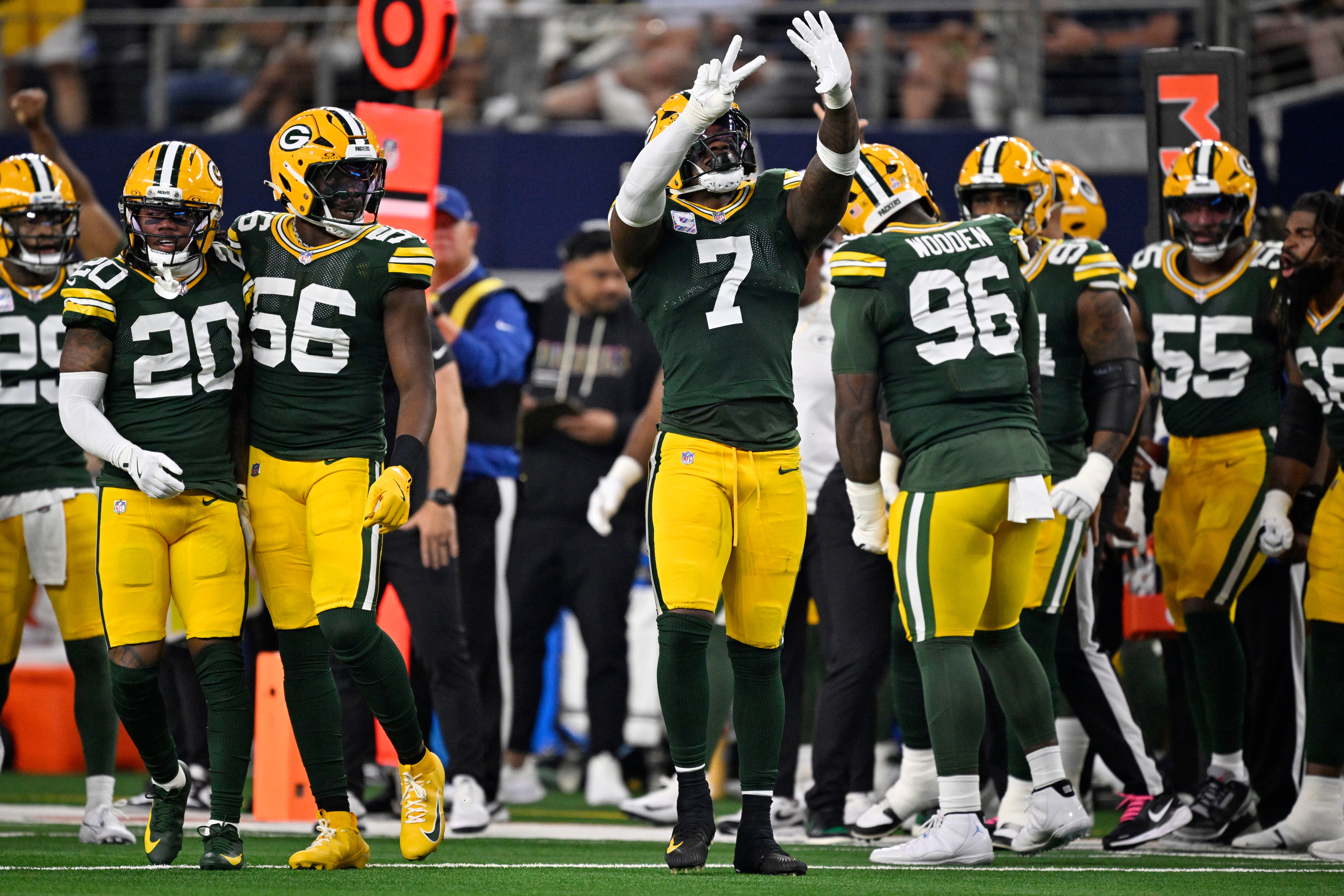 Sep 28, 2025; Arlington, Texas, USA; Green Bay Packers linebacker Quay Walker (7) celebrates after a defending against the Dallas Cowboys in the first quarter at AT&T Stadium.