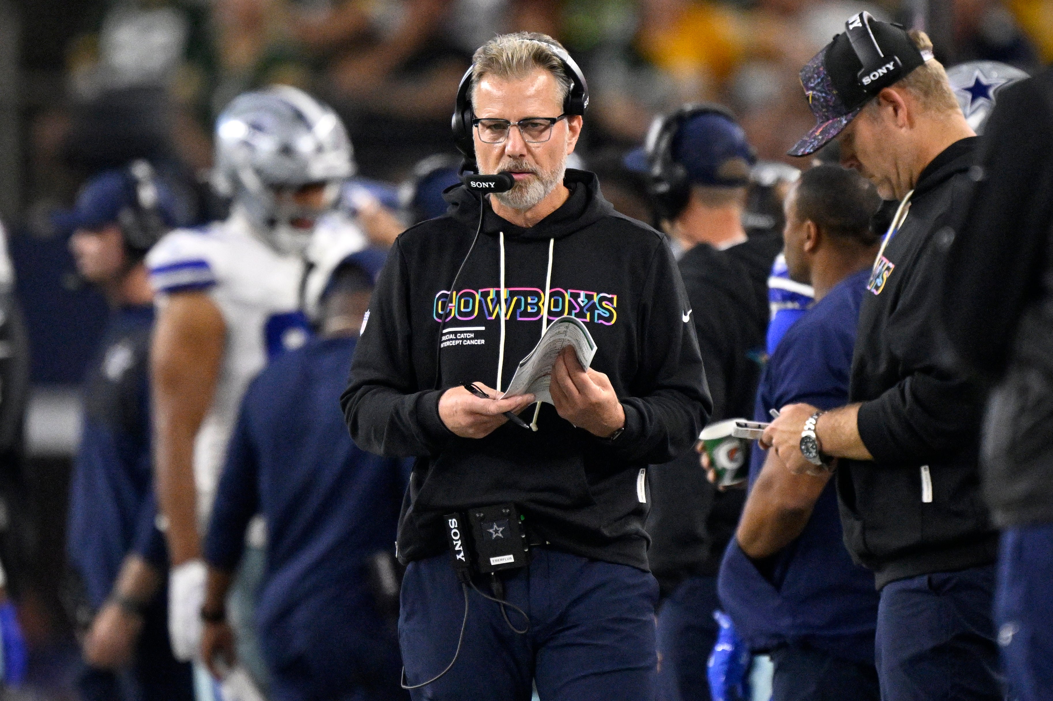 Sep 28, 2025; Arlington, Texas, USA; Dallas Cowboys defensive coordinator Matt Eberflus looks on in the first half against the Green Bay Packers at AT&T Stadium.