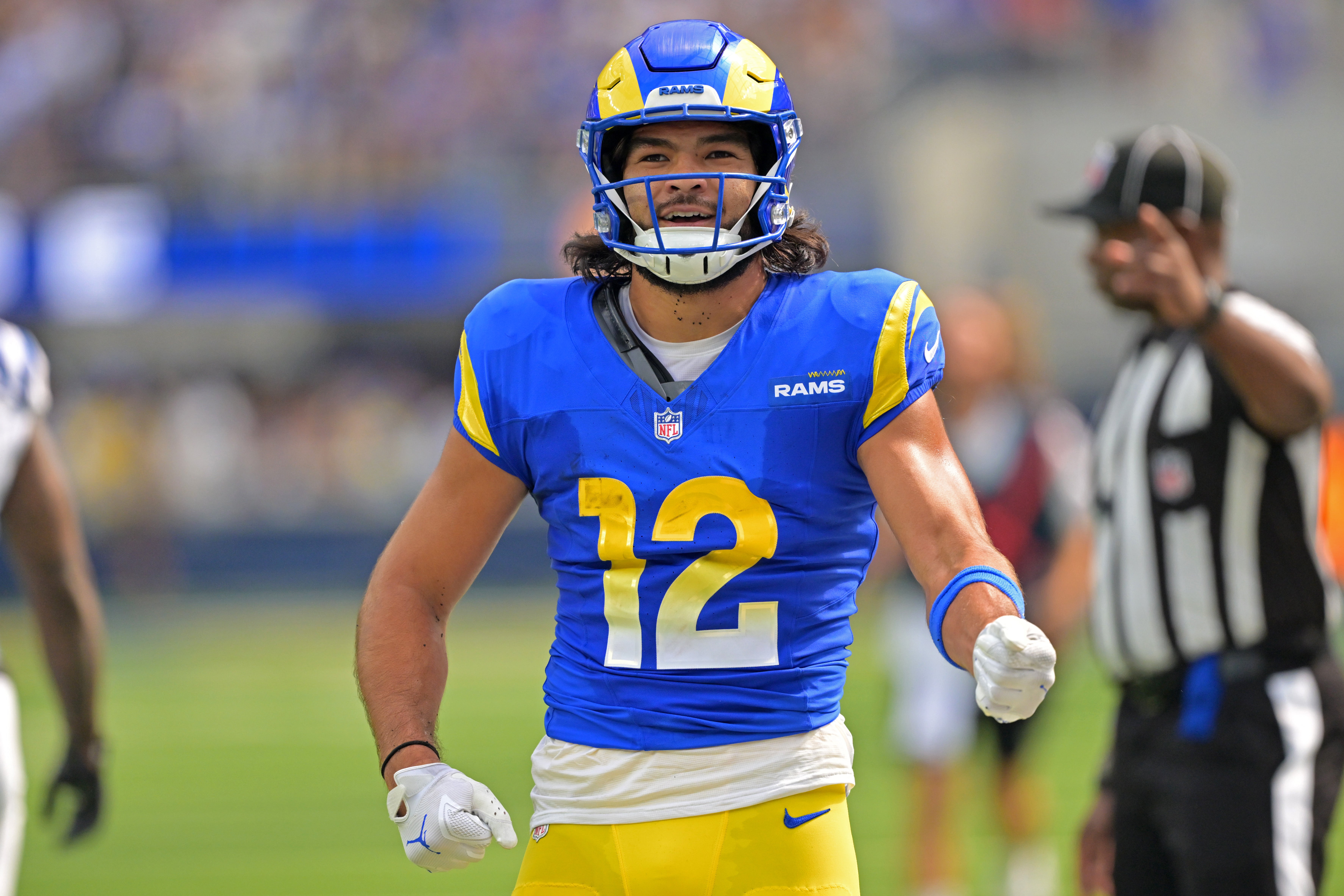 Sep 28, 2025; Inglewood, California, USA; Los Angeles Rams wide receiver Puka Nacua (12) celebrates after a complete pass and first down during the first half against the Indianapolis Colts at SoFi Stadium.
