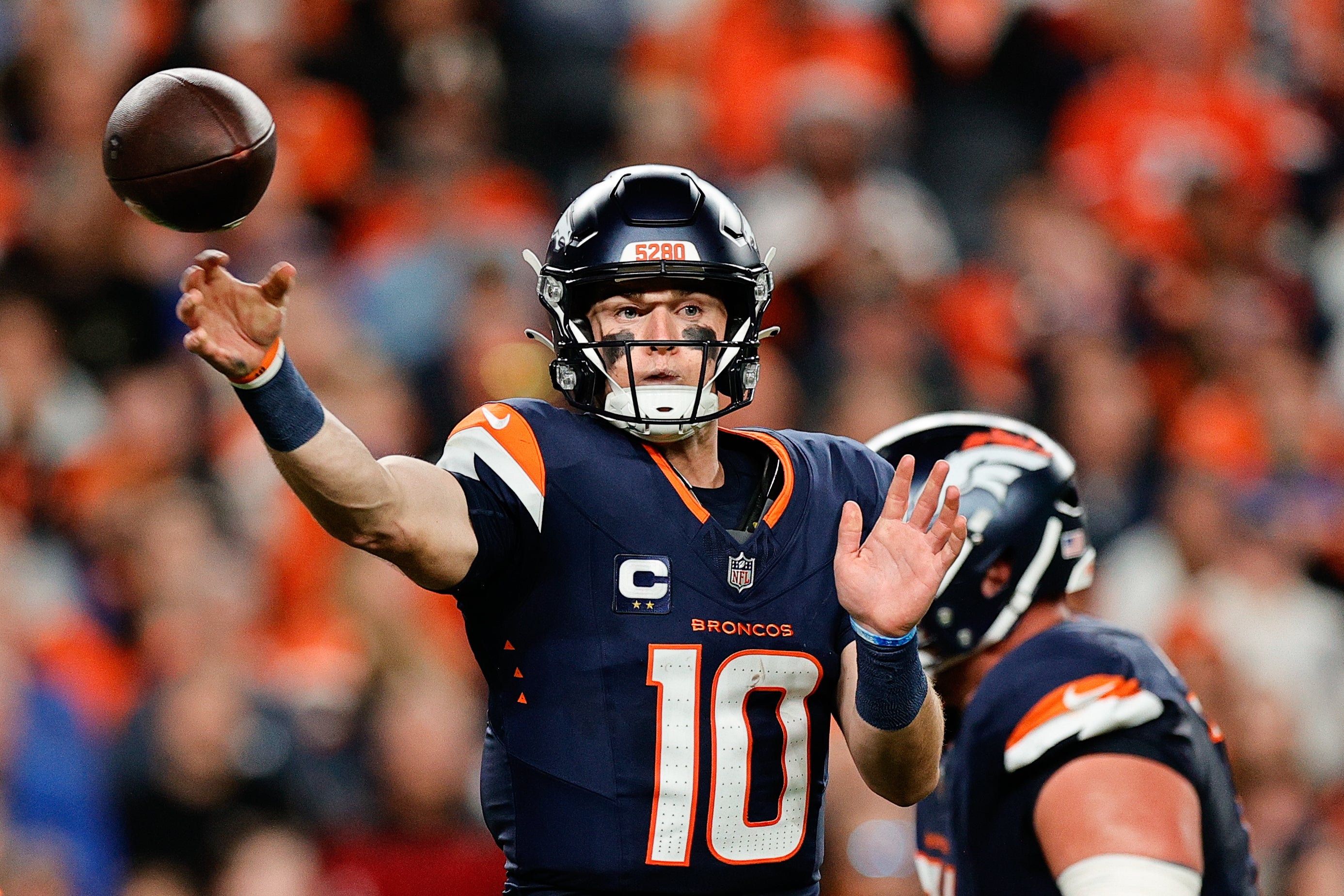 Sep 29, 2025; Denver, Colorado, USA; Denver Broncos quarterback Bo Nix (10) throws a pass during the third quarter against the Cincinnati Bengals at Empower Field at Mile High.