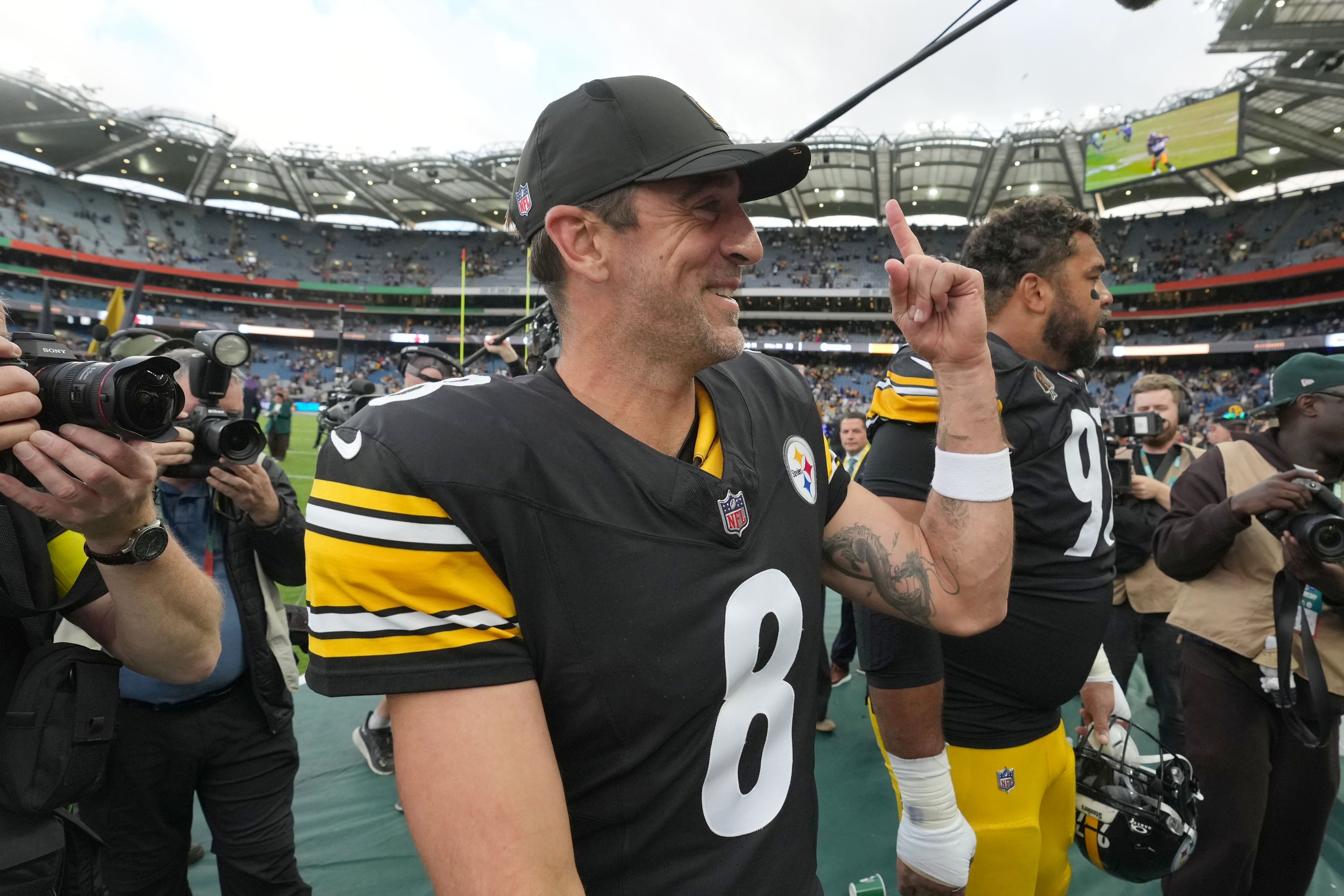 Sep 28, 2025; Dublin, Ireland; Pittsburgh Steelers quarterback Aaron Rodgers (8) and defensive tackle Cameron Heyward (97) leave the field after an NFL International Series game against the Minnesota Vikings at Croke Park.