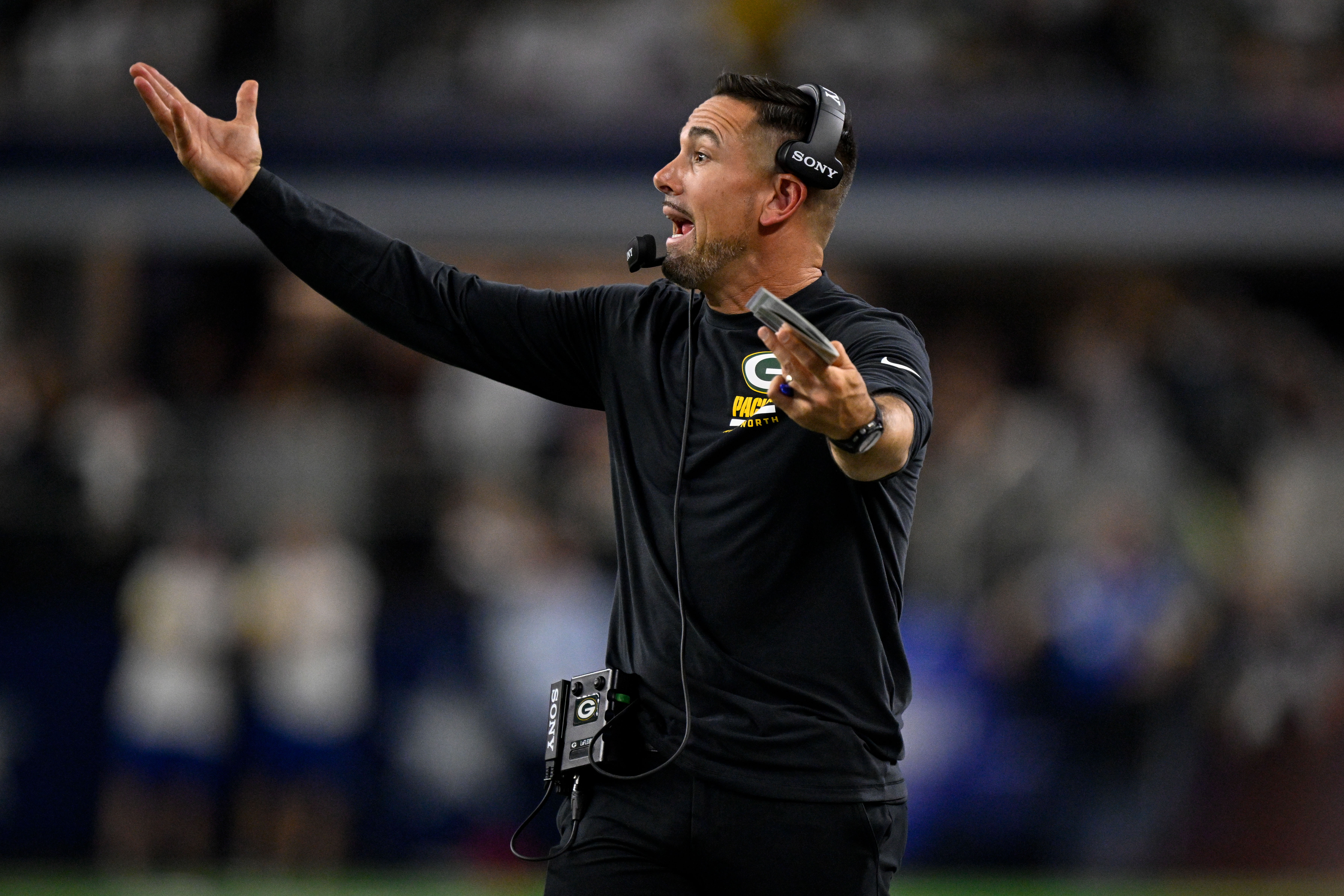 Sep 28, 2025; Arlington, Texas, USA; Green Bay Packers head coach Matt LaFleur motions from the sidelines during the game between the Dallas Cowboys and the Green Bay Packers at AT&T Stadium.