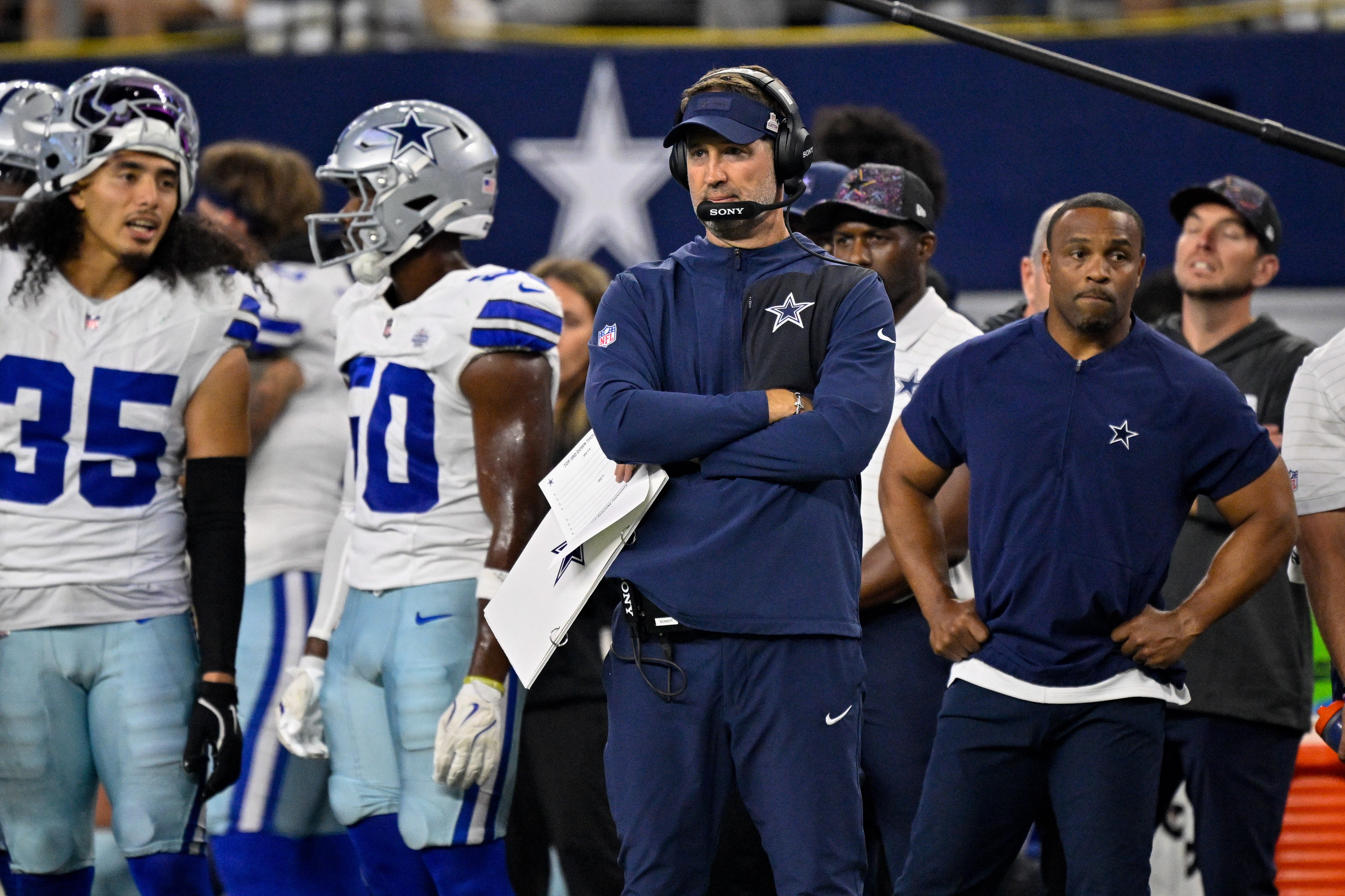 Dallas Cowboys head coach Brian Schottenheimer looks on from the sidelines during the game between the Dallas Cowboys and the Green Bay Packers at AT&T Stadium.