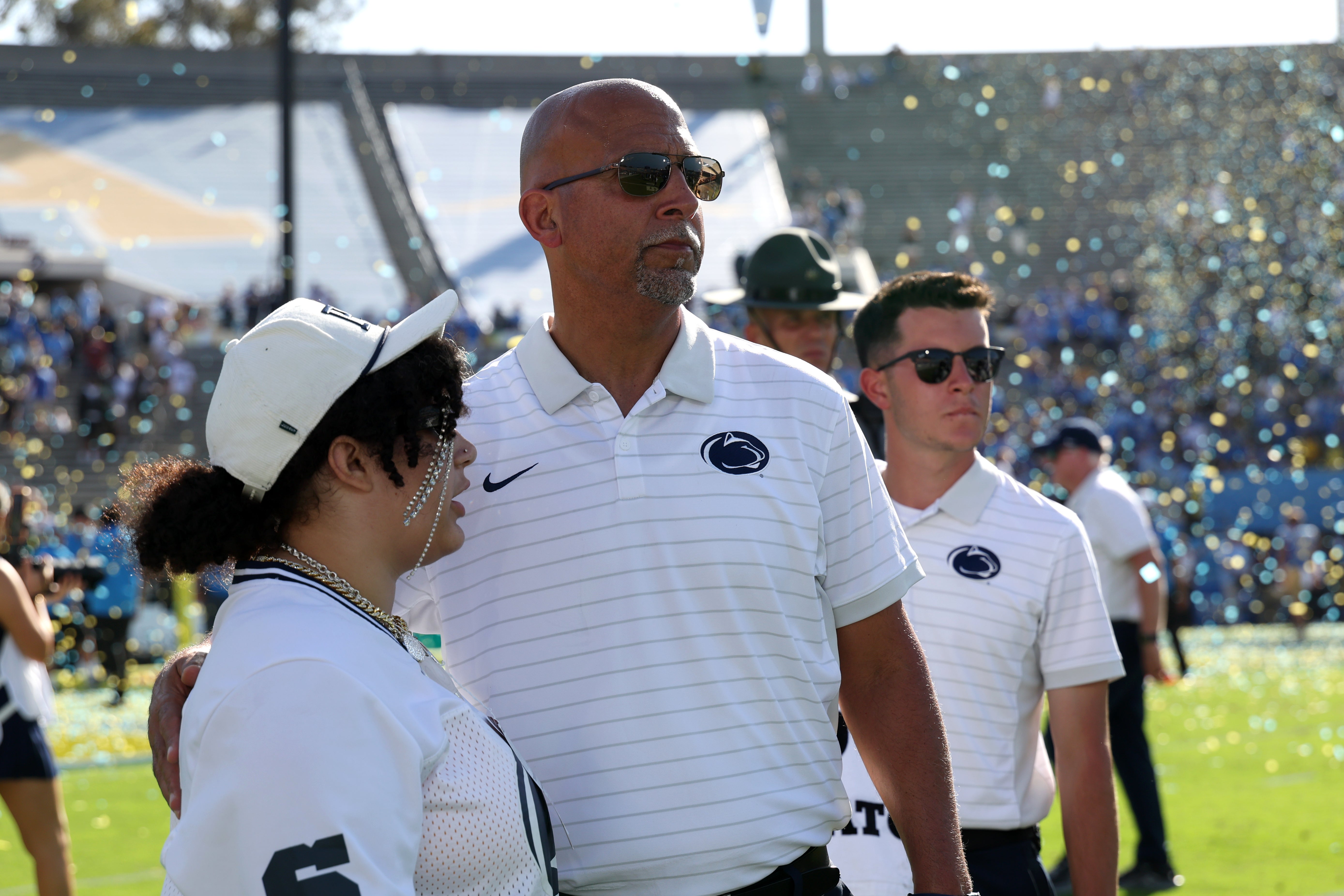 Oct 4, 2025; Pasadena, California, USA; Penn State Nittany Lions head coach James Franklin (middle) looks on after defeated by UCLA Bruins 42-37 at Rose Bowl.