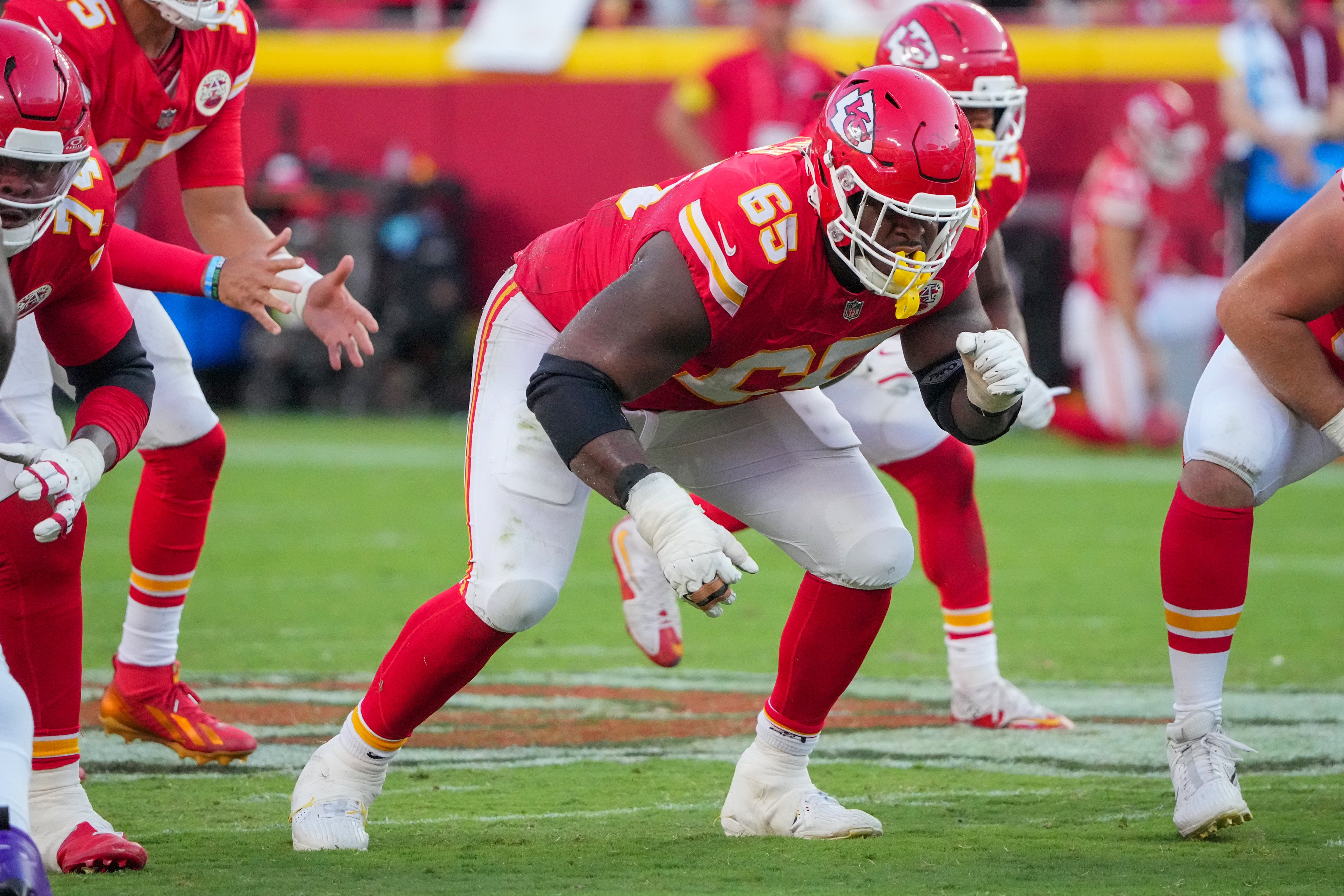 Kansas City Chiefs guard Trey Smith (65) at the line of scrimmage