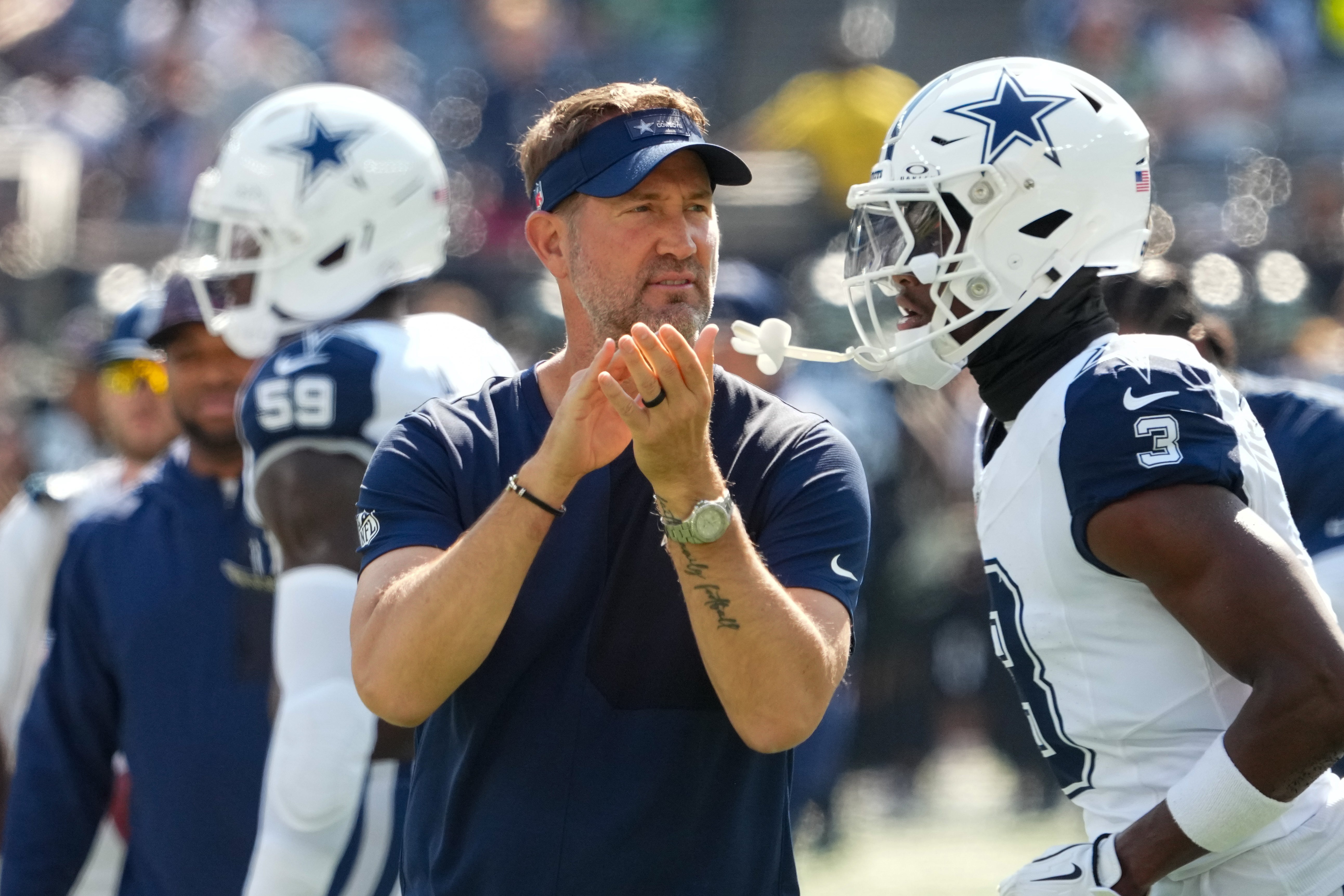 Oct 5, 2025; East Rutherford, New Jersey, USA; Dallas Cowboys head coach Brian Schottenheimer on the field during warm ups prior to a game against the New York Jets at MetLife Stadium.