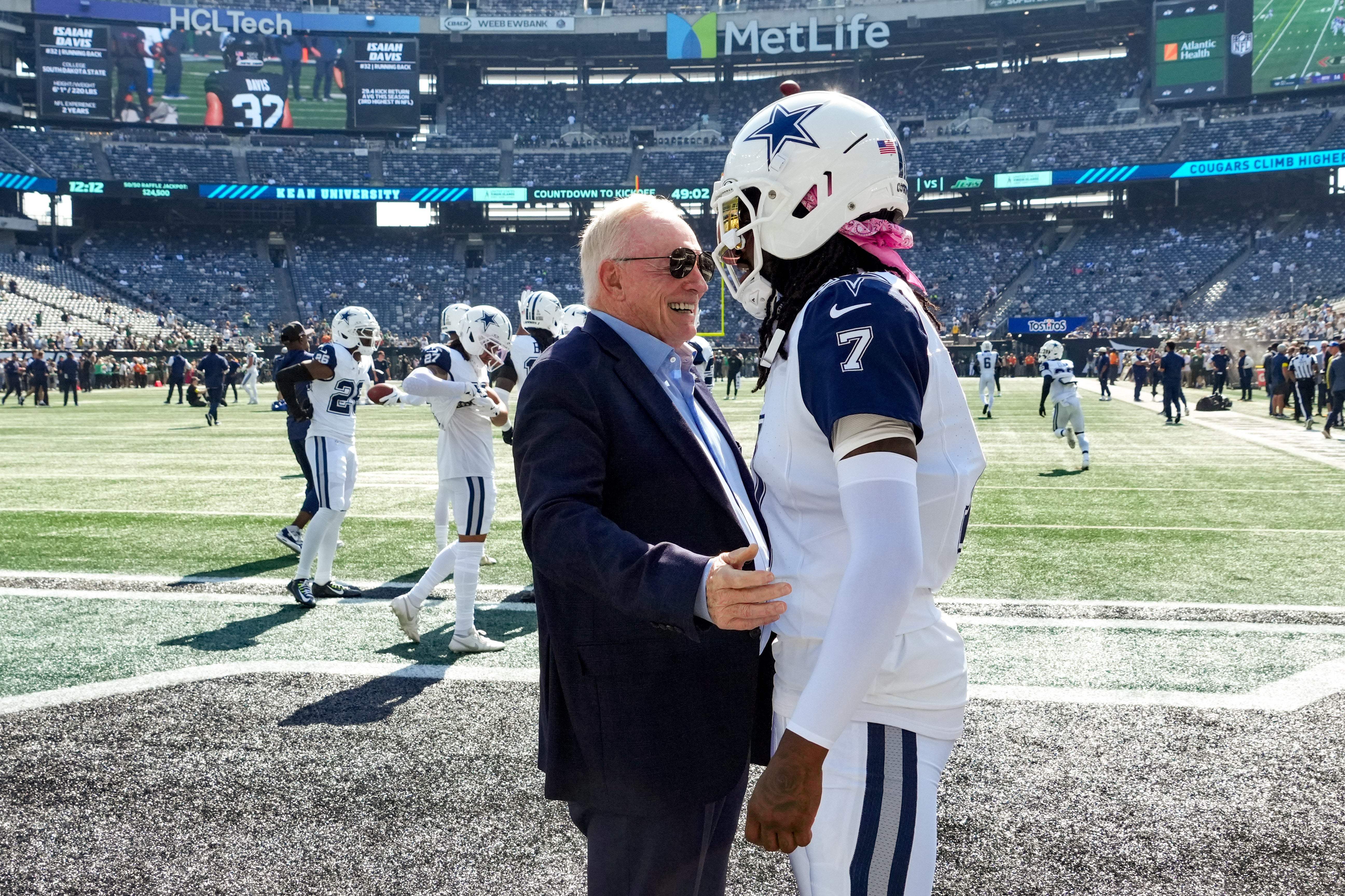 Oct 5, 2025; East Rutherford, New Jersey, USA; Dallas Cowboys Owner, President and general manager Jerry Jones with cornerback Trevon Diggs (7) on the field prior to a game against the New York Jets at MetLife Stadium.