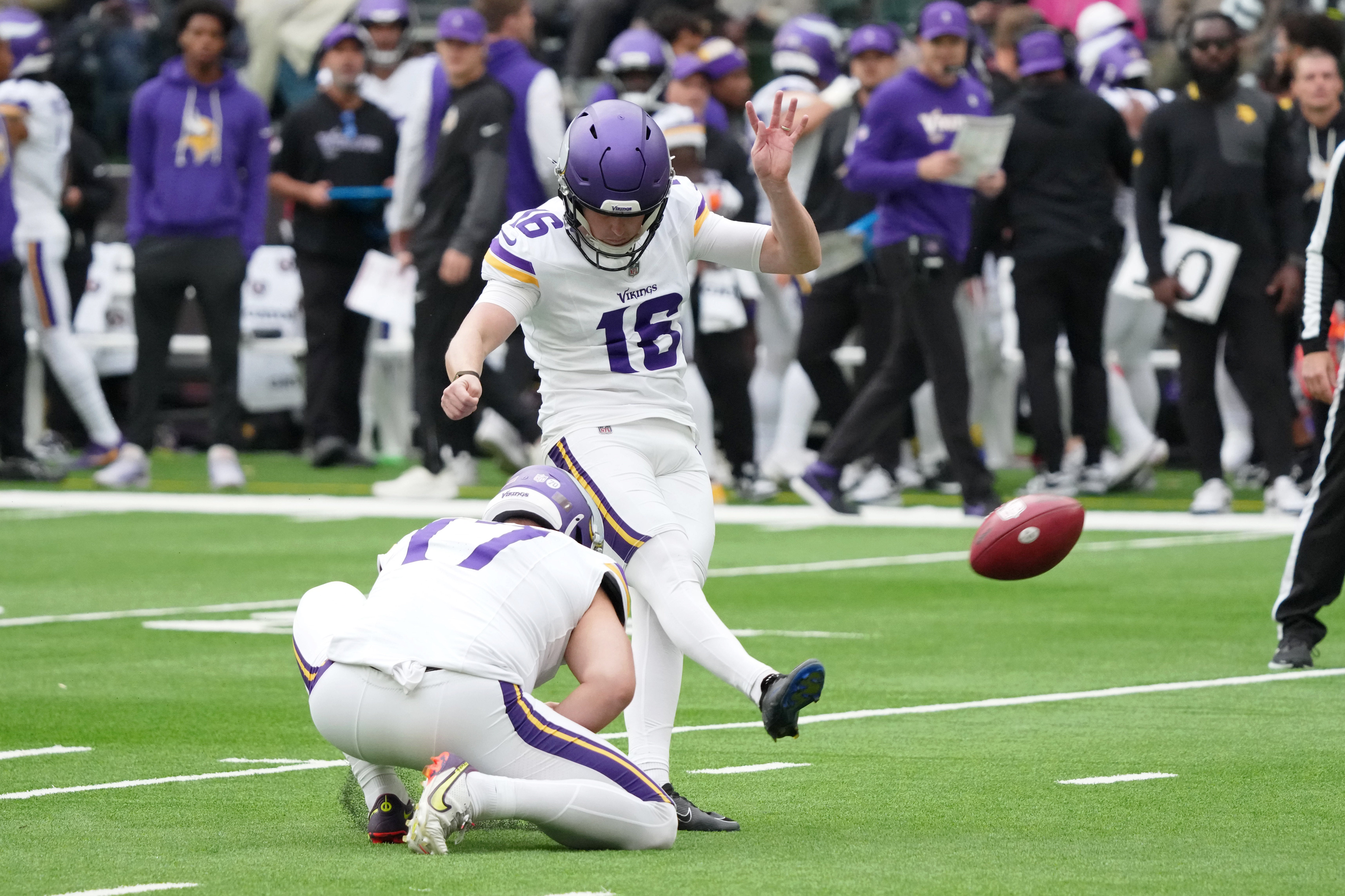 Oct 5, 2025; Tottenham, United Kingdom; Minnesota Vikings kicker Will Reichard (16) kicks a point after attempt against the Cleveland Browns during the third quarter of an NFL International Series game at Tottenham Hotspur Stadium.