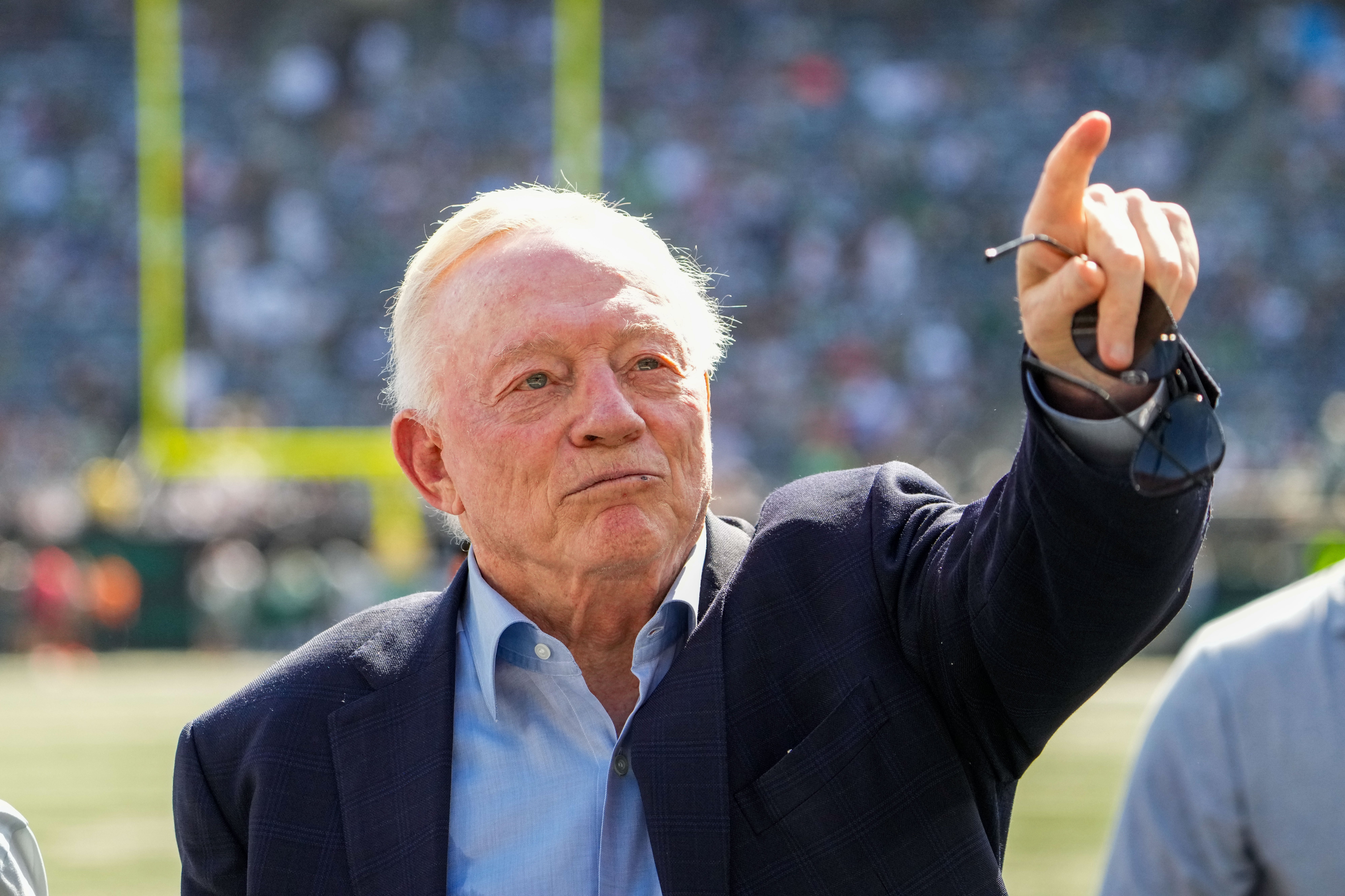 Oct 5, 2025; East Rutherford, New Jersey, USA; Dallas Cowboys Owner, President and general manager Jerry Jones stands on the field prior to a game against the New York Jets at MetLife Stadium.