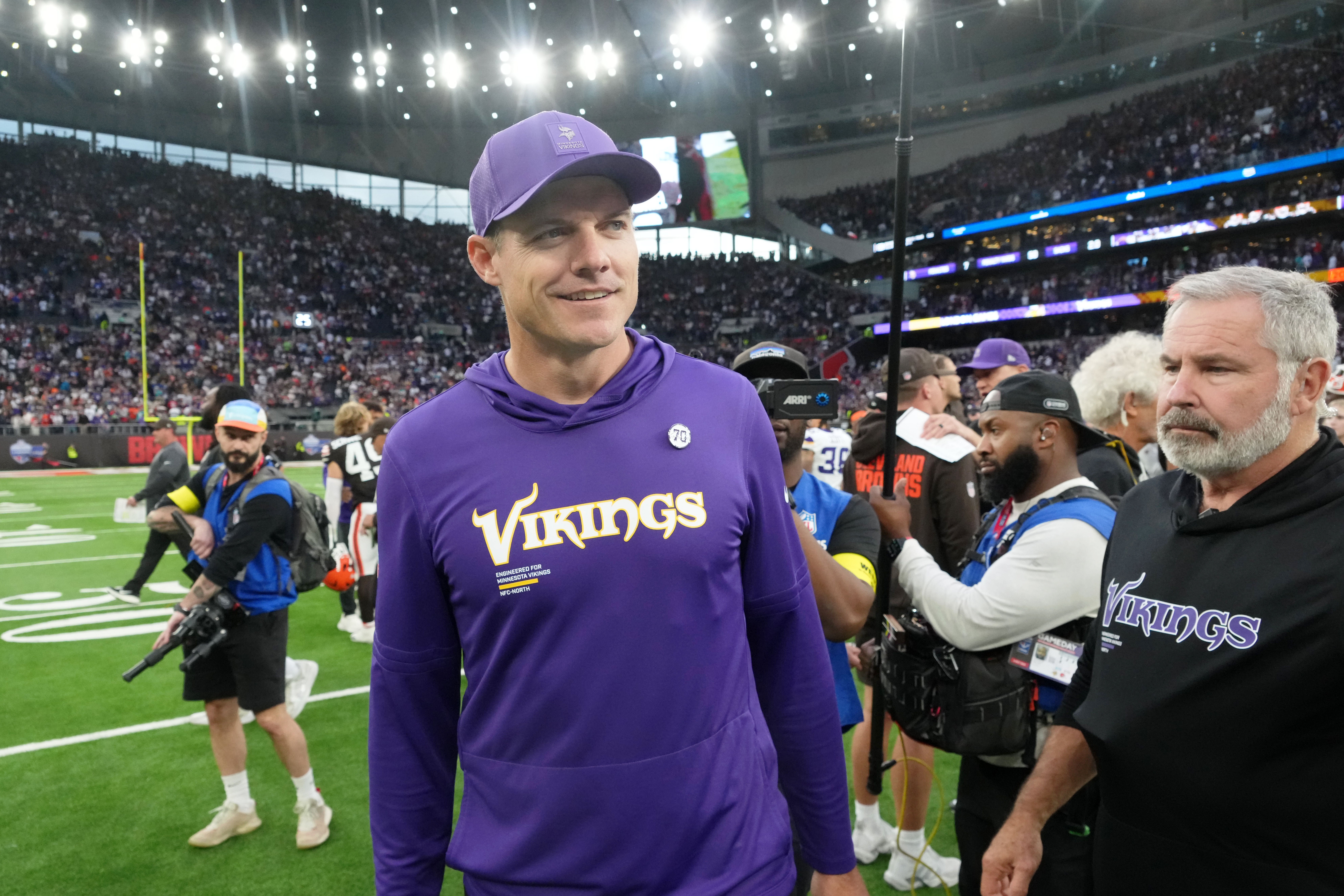 Oct 5, 2025; Tottenham, United Kingdom; Minnesota Vikings head coach Kevin O'Connell walks on the field after their win against the Cleveland Browns in an NFL International Series game at Tottenham Hotspur Stadium.