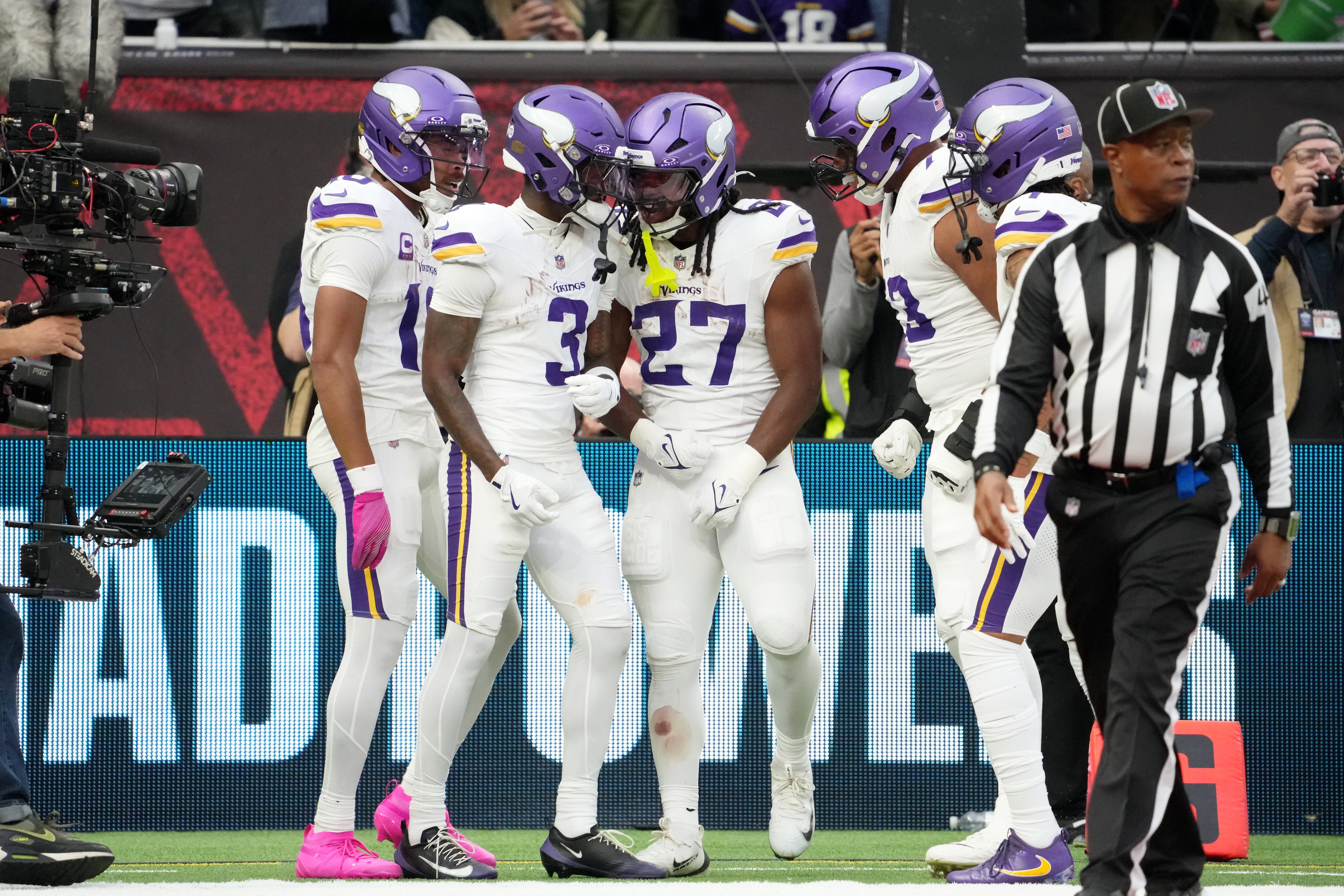 Oct 5, 2025; Tottenham, United Kingdom; Minnesota Vikings wide receiver Jordan Addison (3) celebrates with teammates after a touchdown against the Cleveland Browns during the fourth quarter of an NFL International Series game at Tottenham Hotspur Stadium.