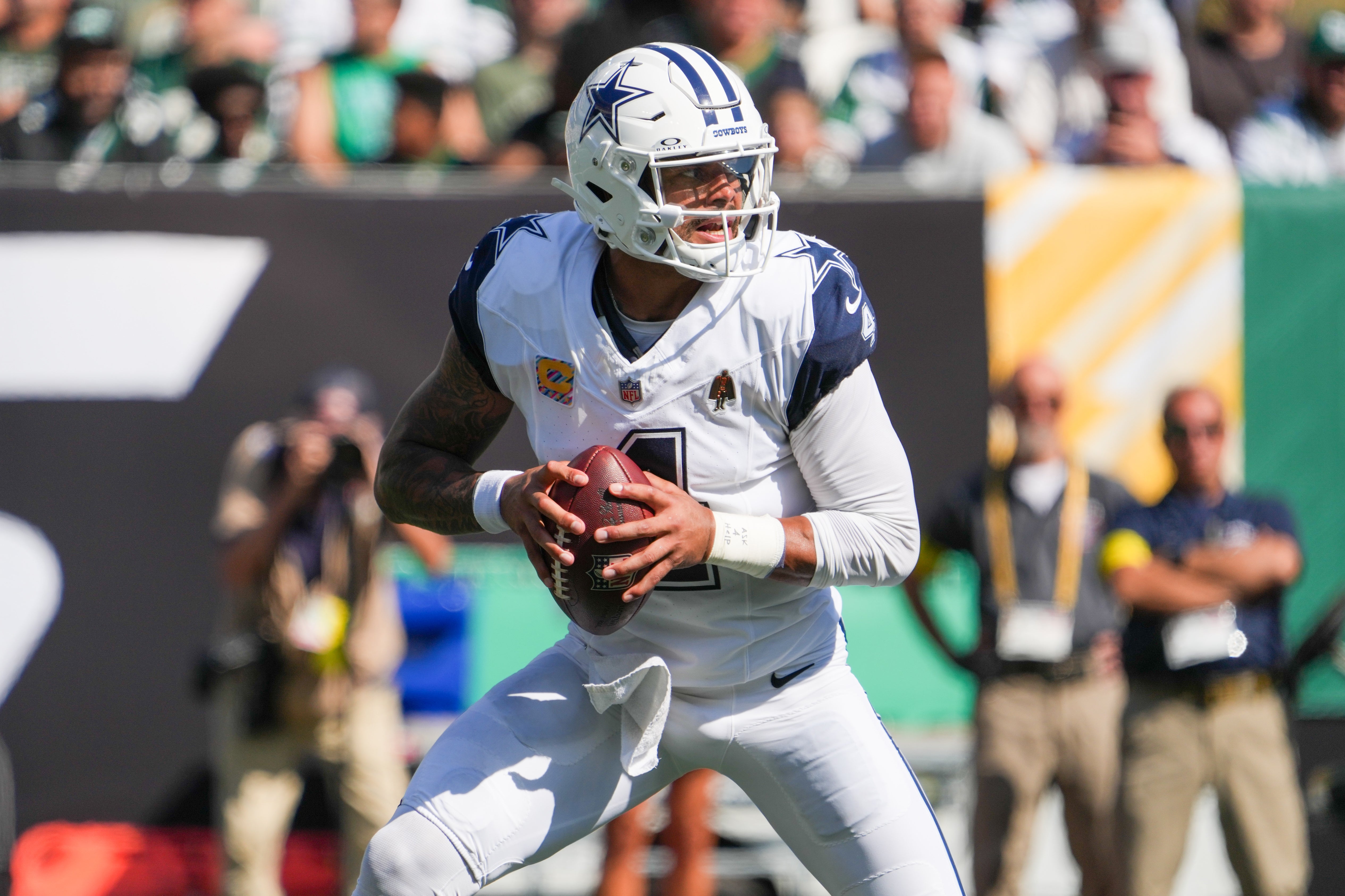 Oct 5, 2025; East Rutherford, New Jersey, USA; Dallas Cowboys quarterback Dak Prescott (4) stands in the pocket during the first half against the New York Jets at MetLife Stadium.