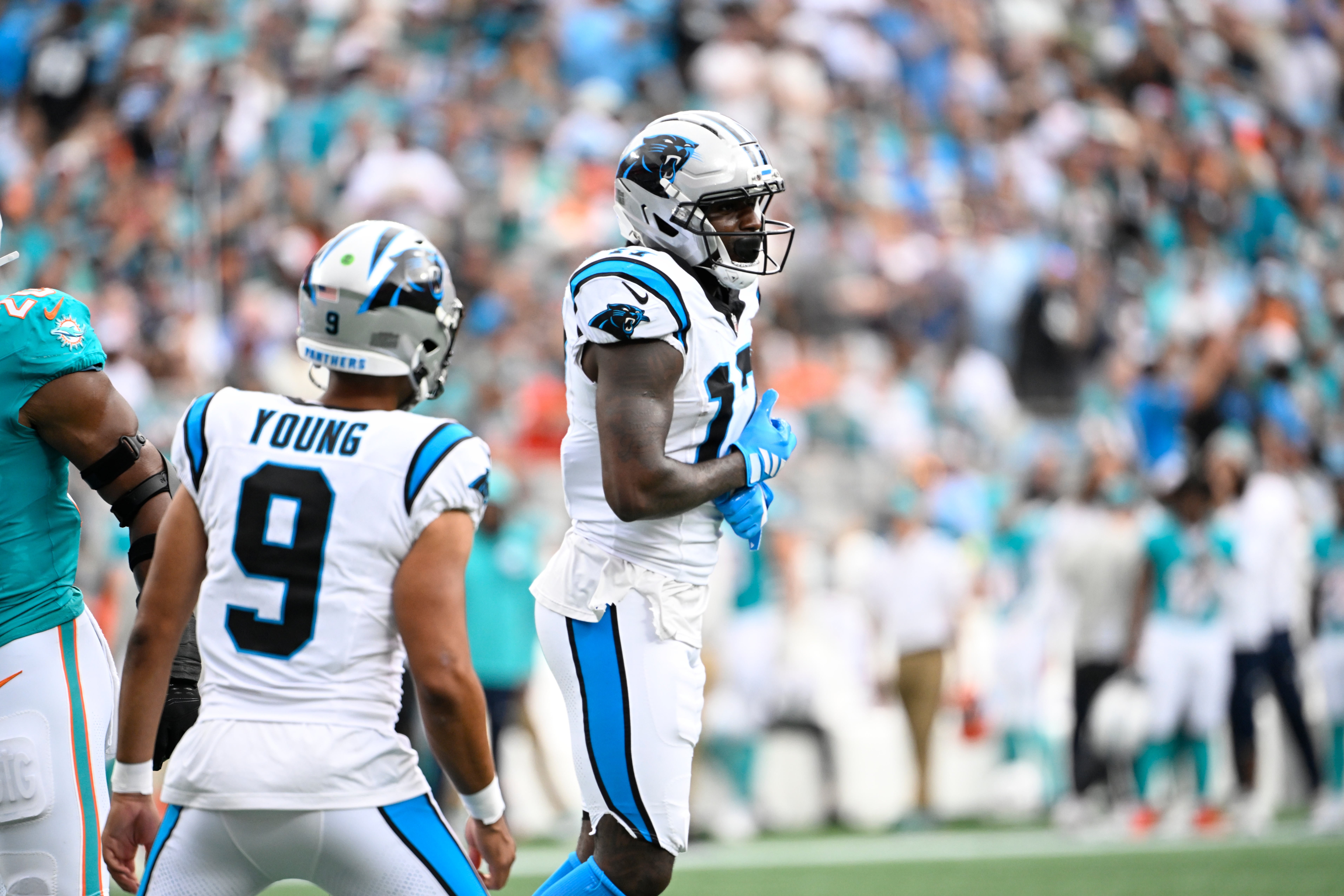Oct 5, 2025; Charlotte, North Carolina, USA; Carolina Panthers wide receiver Xavier Legette (17) reacts after catching a touchdown pass from quarterback Bryce Young (9) in the second quarter at Bank of America Stadium.