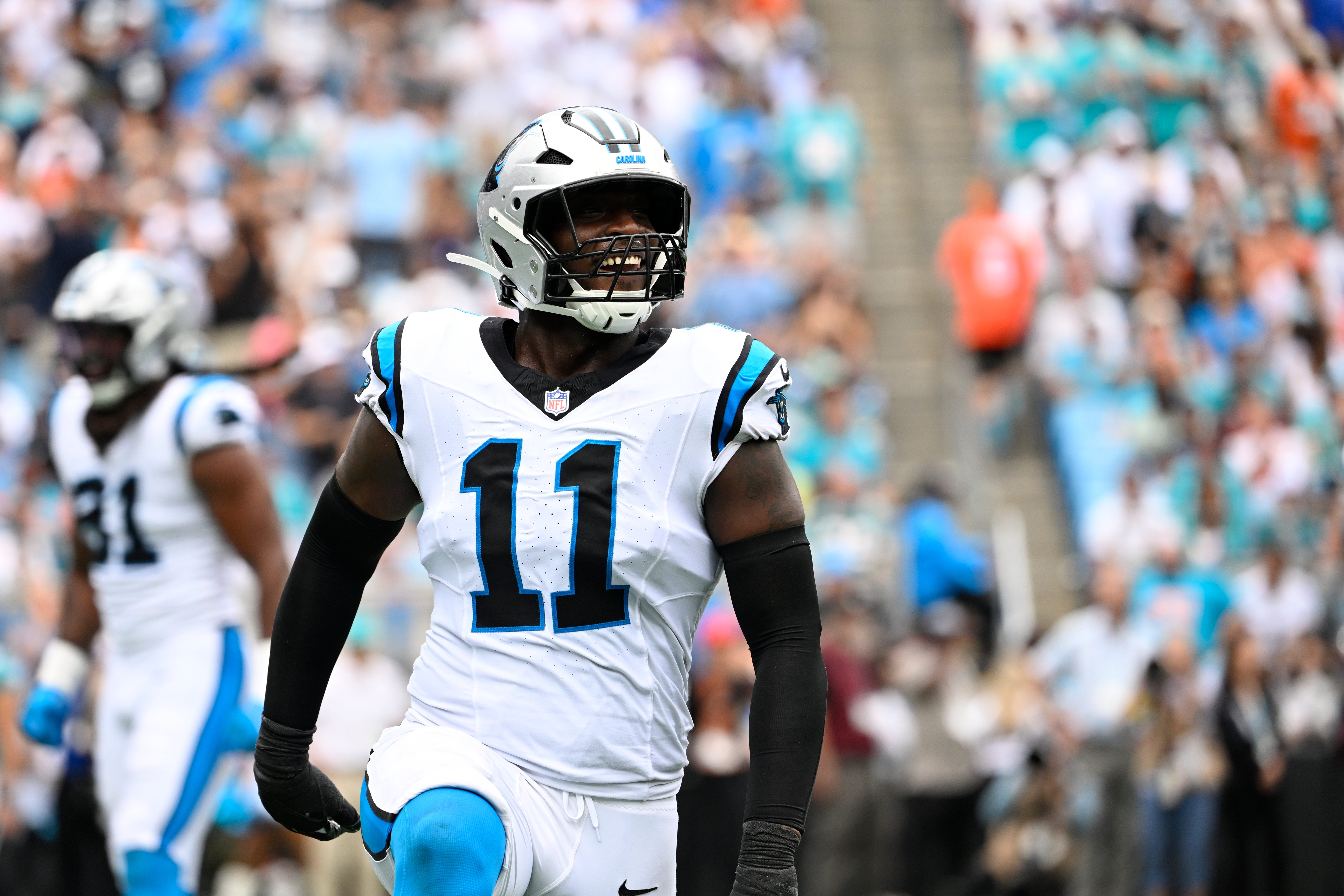 Oct 5, 2025; Charlotte, North Carolina, USA; Carolina Panthers linebacker Nic Scourton (11) reacts in the second quarter at Bank of America Stadium.