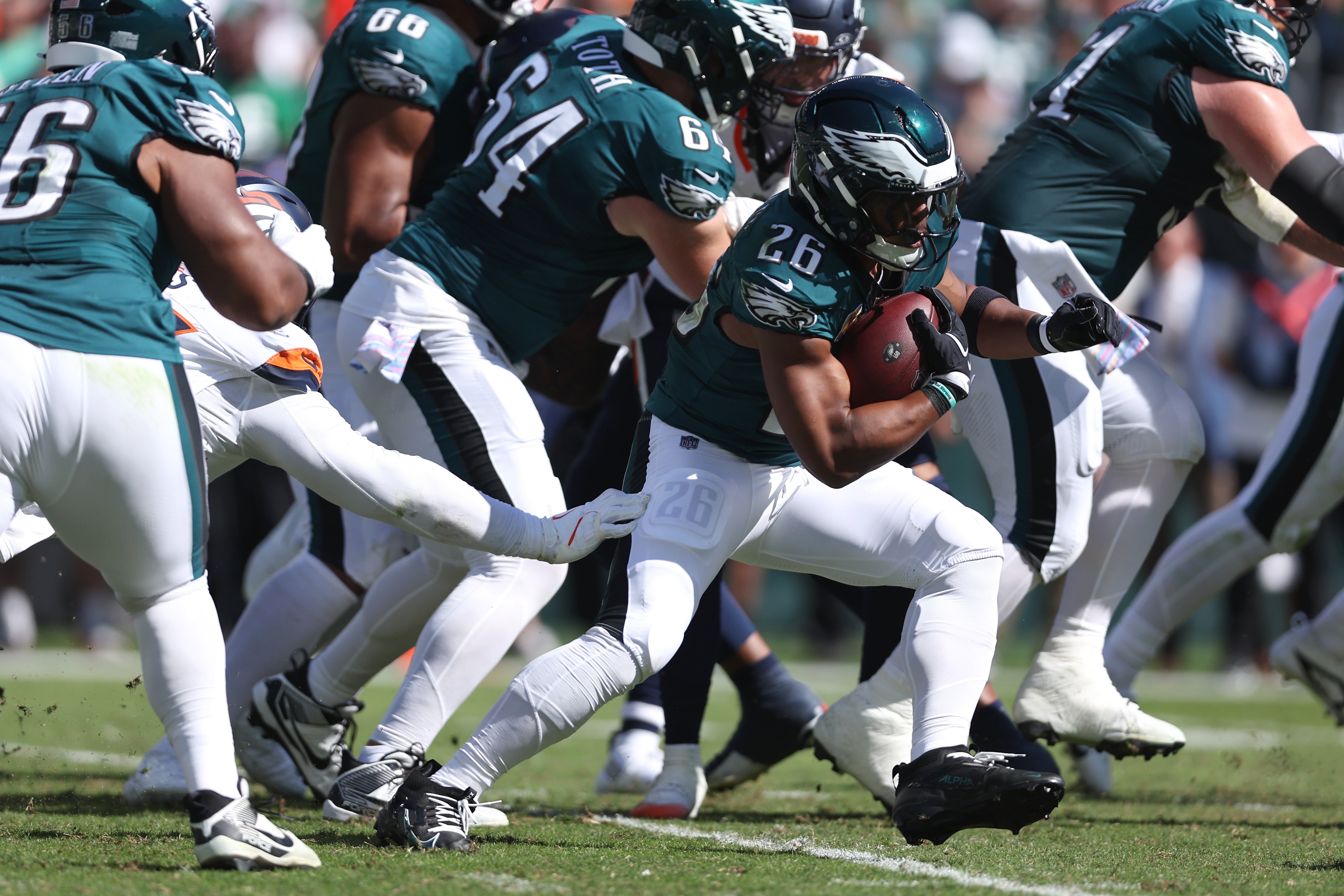 Philadelphia Eagles running back Saquon Barkley (26) runs against the Denver Broncos in the second quarter at Lincoln Financial Field.