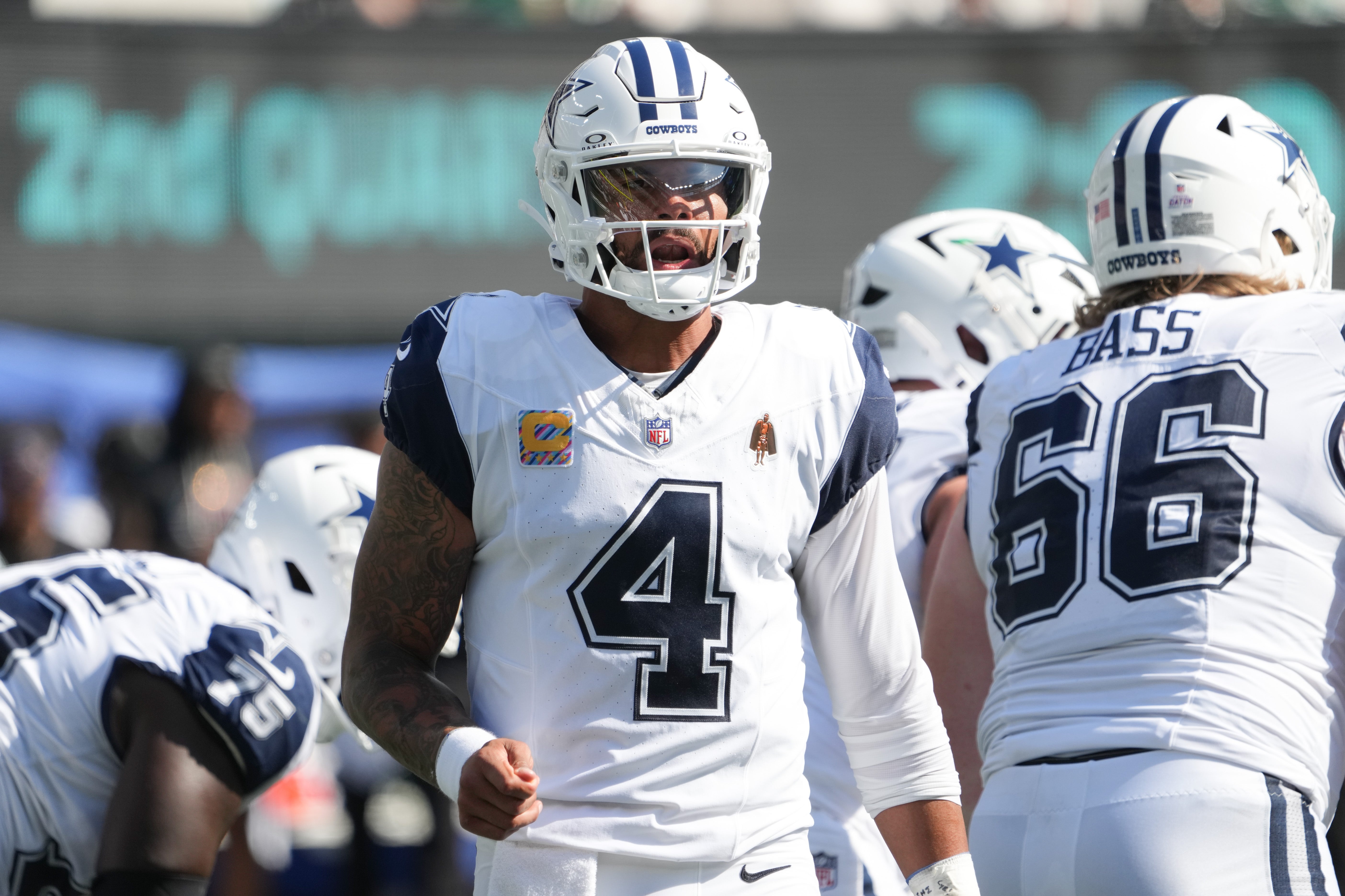 Dallas Cowboys quarterback Dak Prescott (4) looks towards the sidelines during the first half against the New York Jets at MetLife Stadium.