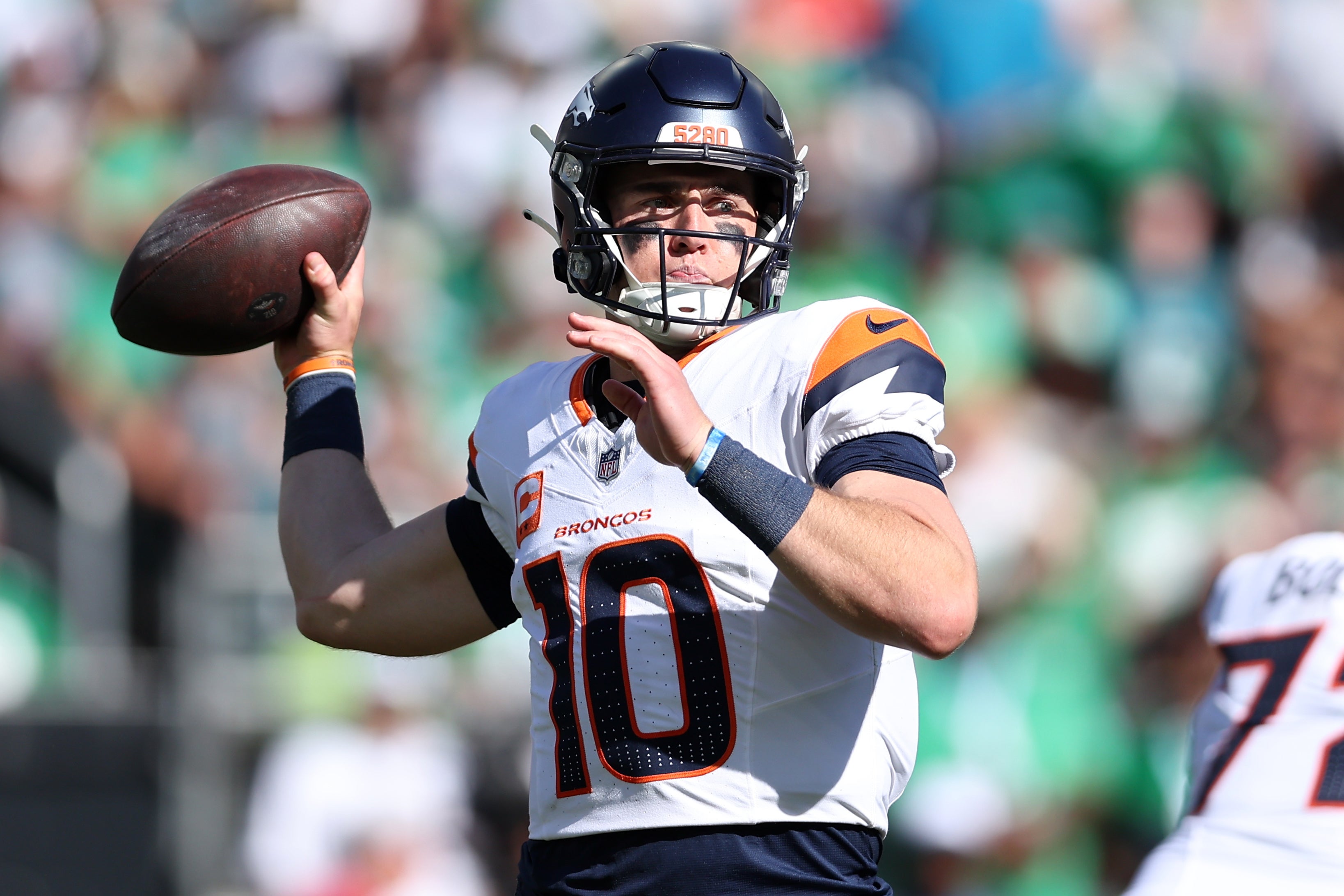 Oct 5, 2025; Philadelphia, Pennsylvania, USA; Denver Broncos quarterback Bo Nix (10) throws against the Philadelphia Eagles in the second half at Lincoln Financial Field.