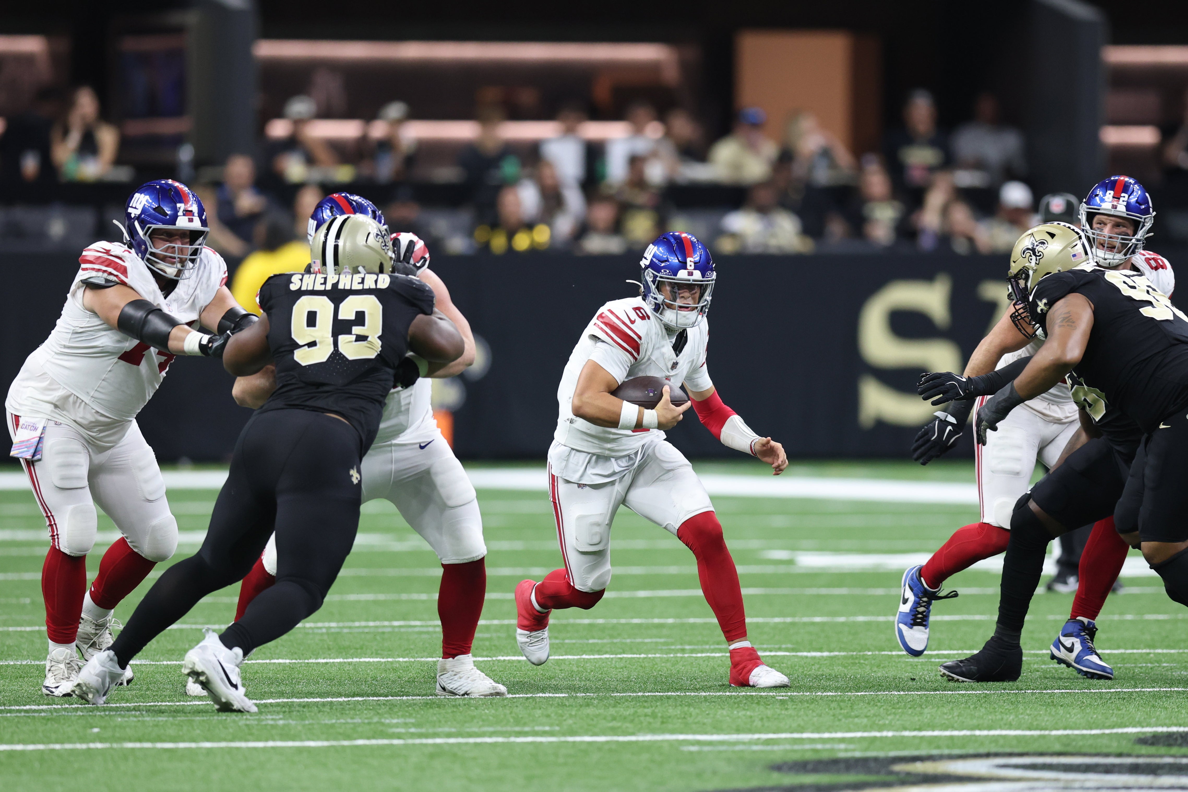 Oct 5, 2025; New Orleans, Louisiana, USA; New York Giants quarterback Jaxson Dart (6) runs with the ball against the New Orleans Saints during the second half at Caesars Superdome.