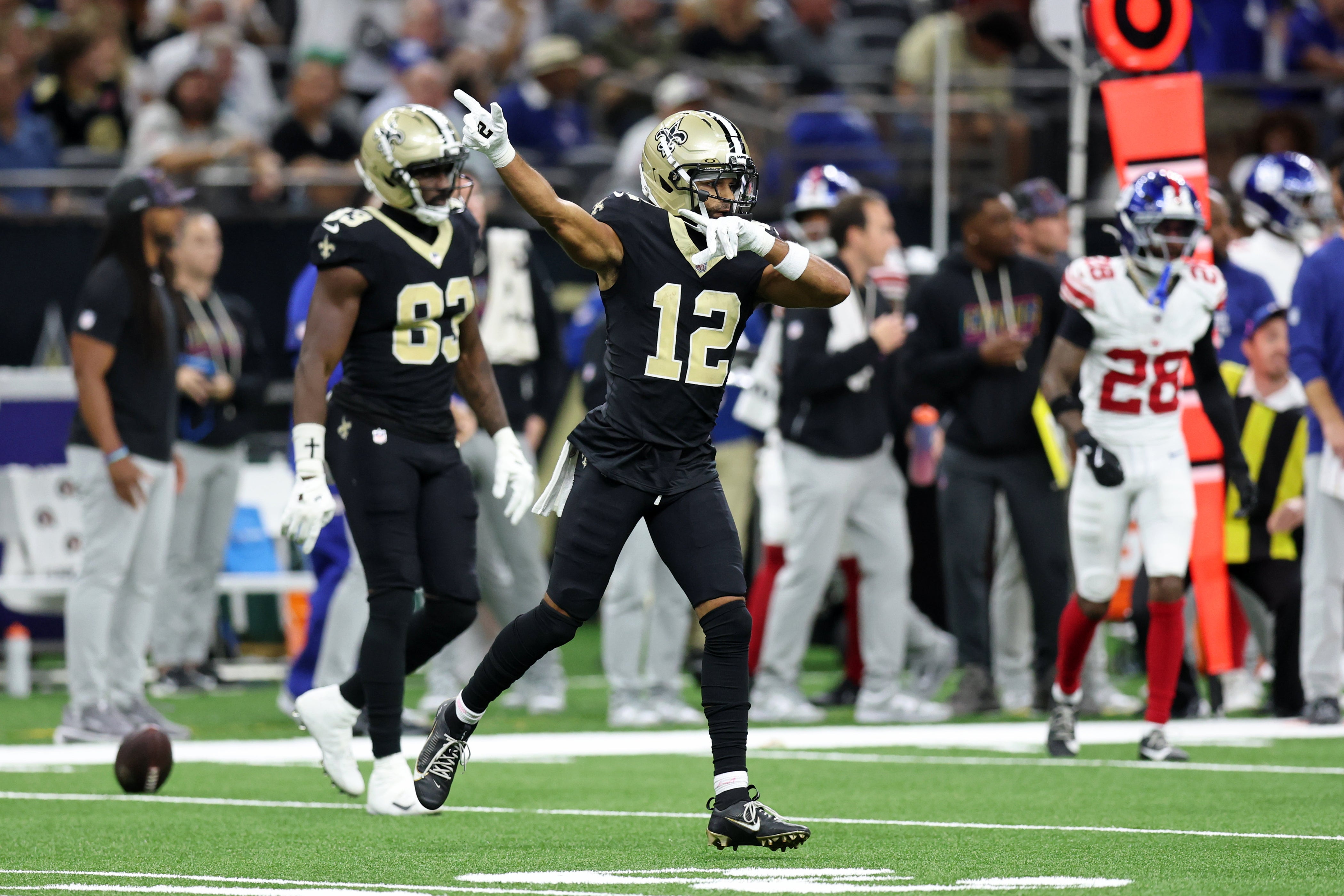Oct 5, 2025; New Orleans, Louisiana, USA; New Orleans Saints wide receiver Chris Olave (12) reacts after a play against the New York Giants during the second half at Caesars Superdome.