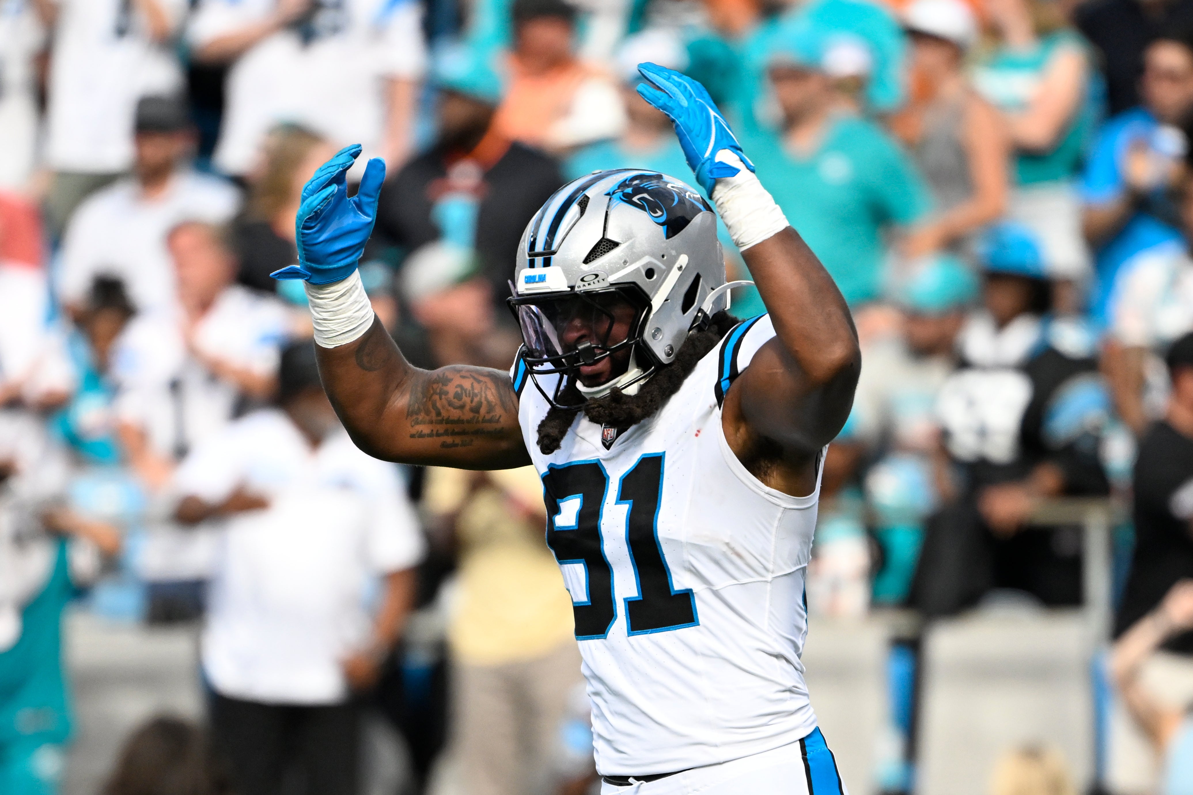 Oct 5, 2025; Charlotte, North Carolina, USA; Carolina Panthers linebacker Patrick Jones II (91) reacts after sacking Miami Dolphins quarterback Tua Tagovailoa (1) (not pictured) on third down late in the fourth quarter at Bank of America Stadium.